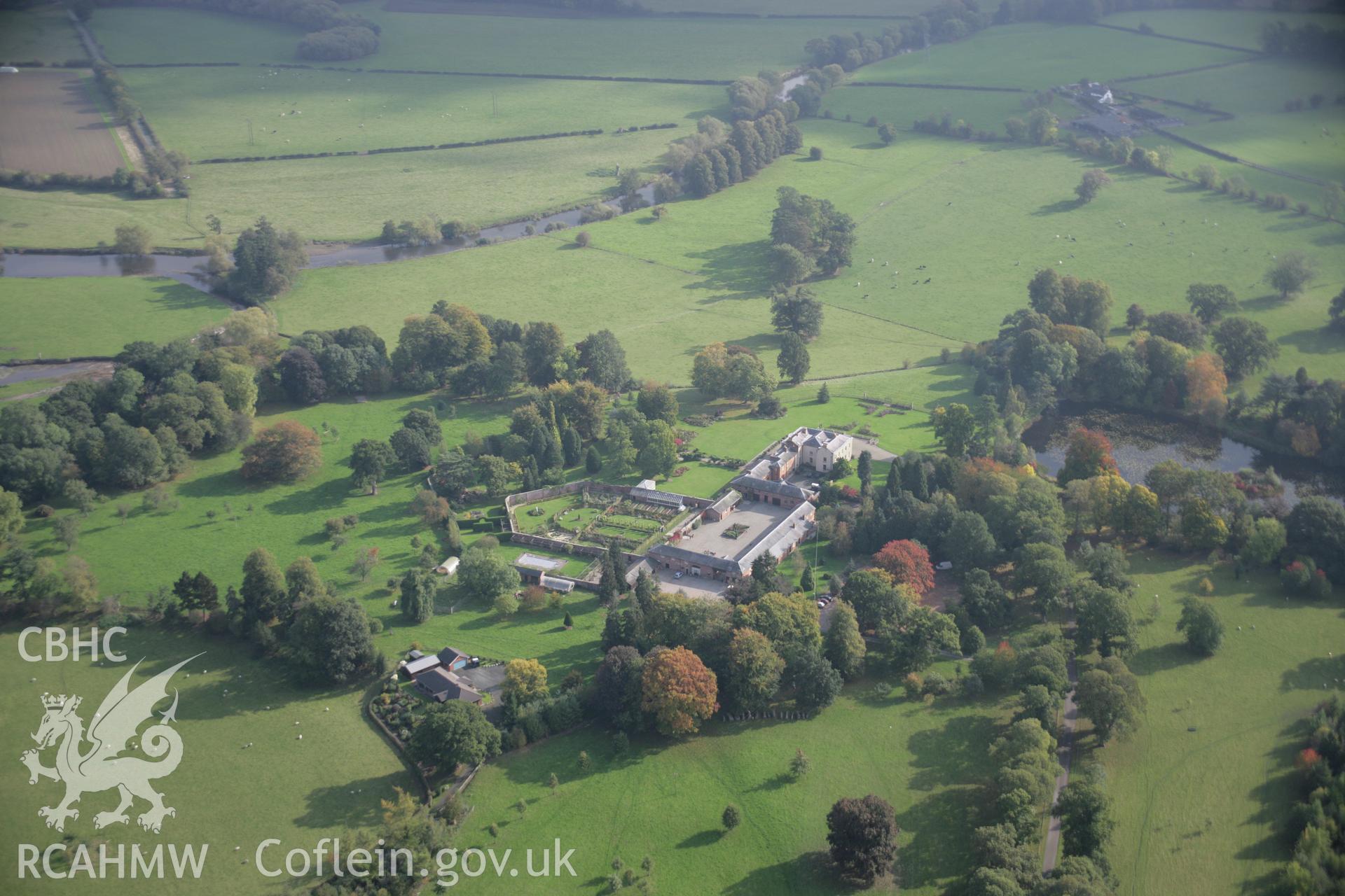RCAHMW colour oblique aerial photograph of Glansevern Hall Garden, Berriew, with autumn colours, from the north-west. Taken on 17 October 2005 by Toby Driver