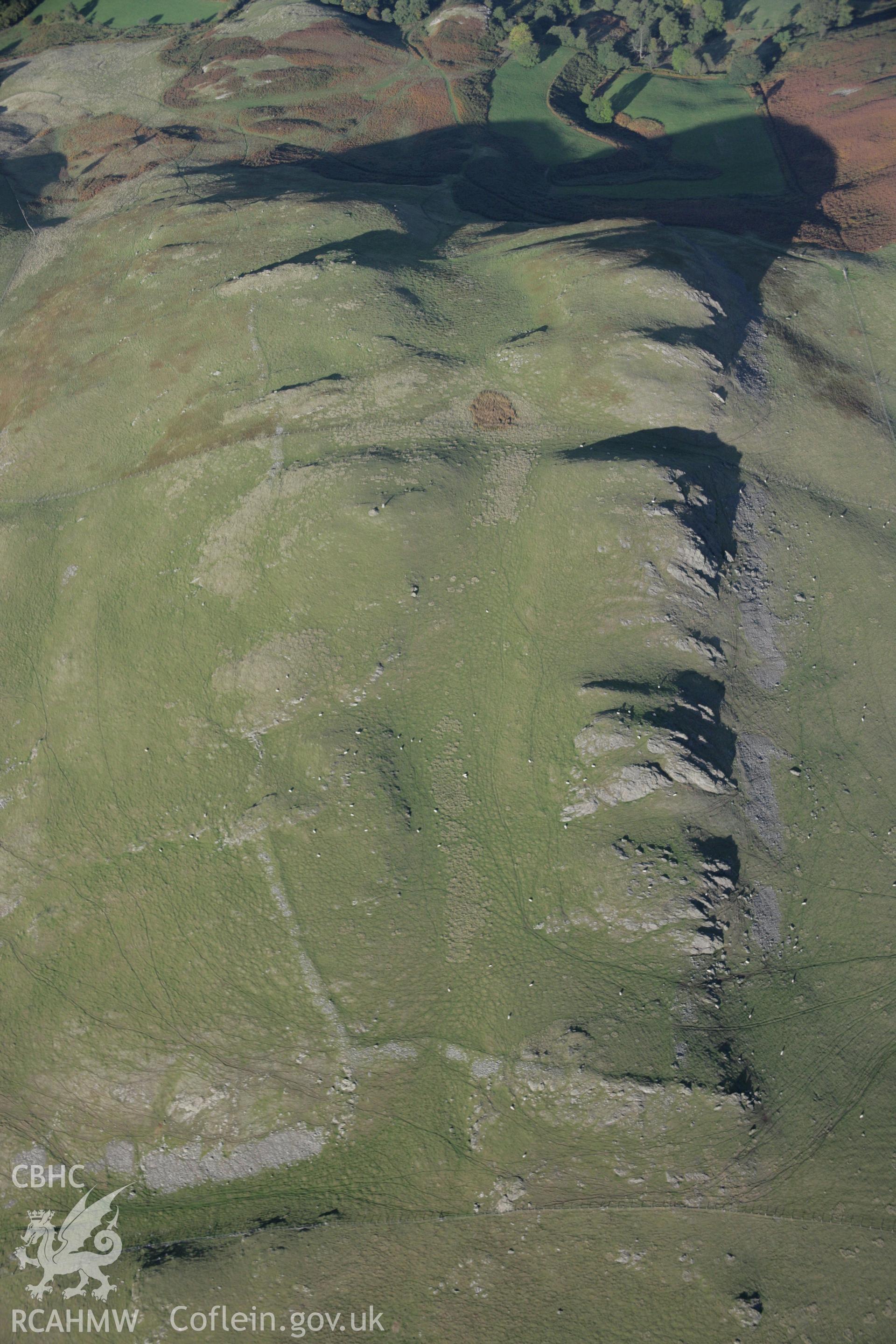 RCAHMW colour oblique aerial photograph of Llandegley Rocks West Enclosure showing hillfort and defended enclosure viewed from the south-west. Taken on 13 October 2005 by Toby Driver