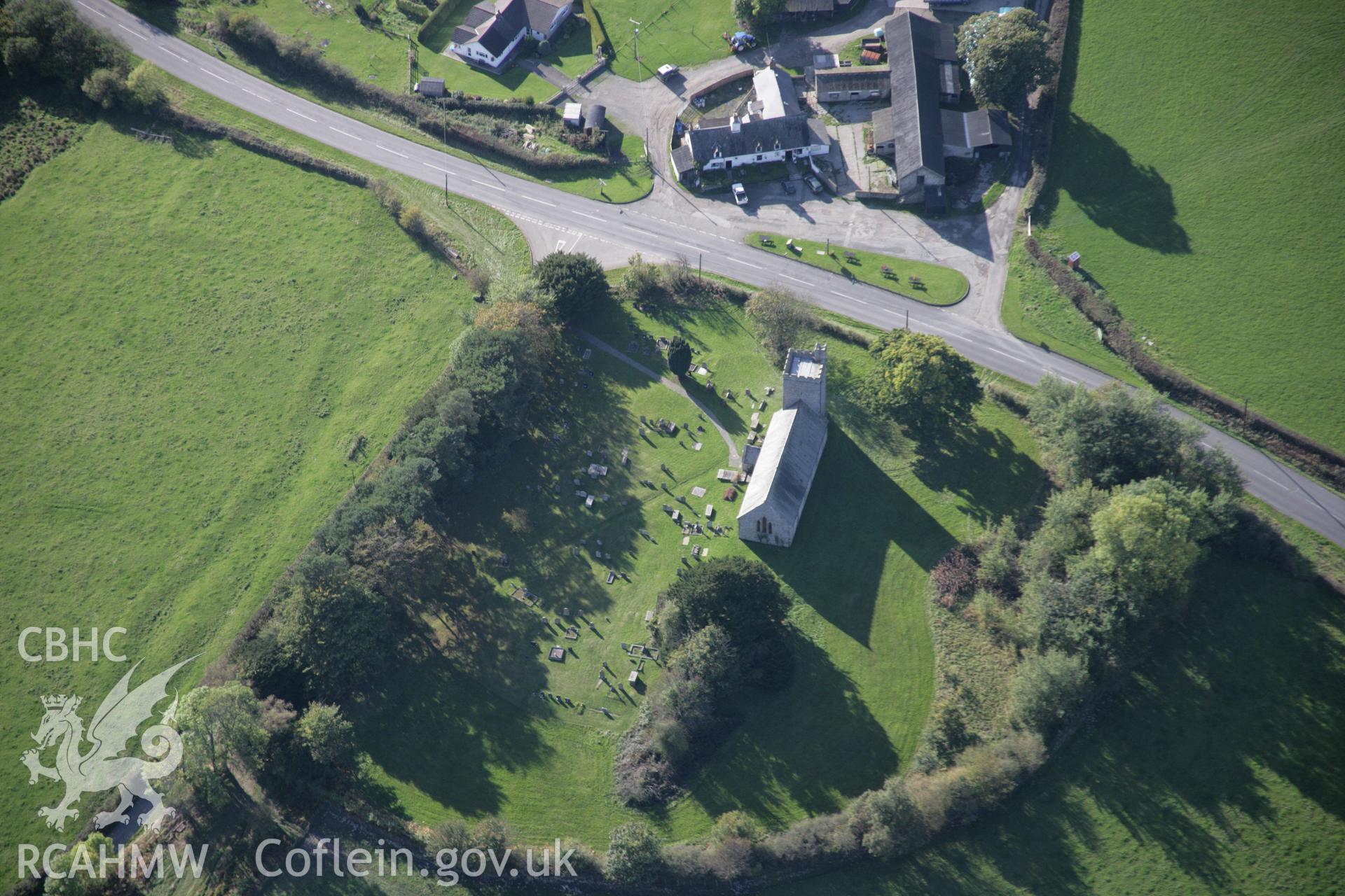 RCAHMW colour oblique aerial photograph of Llanafan Fawr showing the church viewed from the north-east Taken on 13 October 2005 by Toby Driver