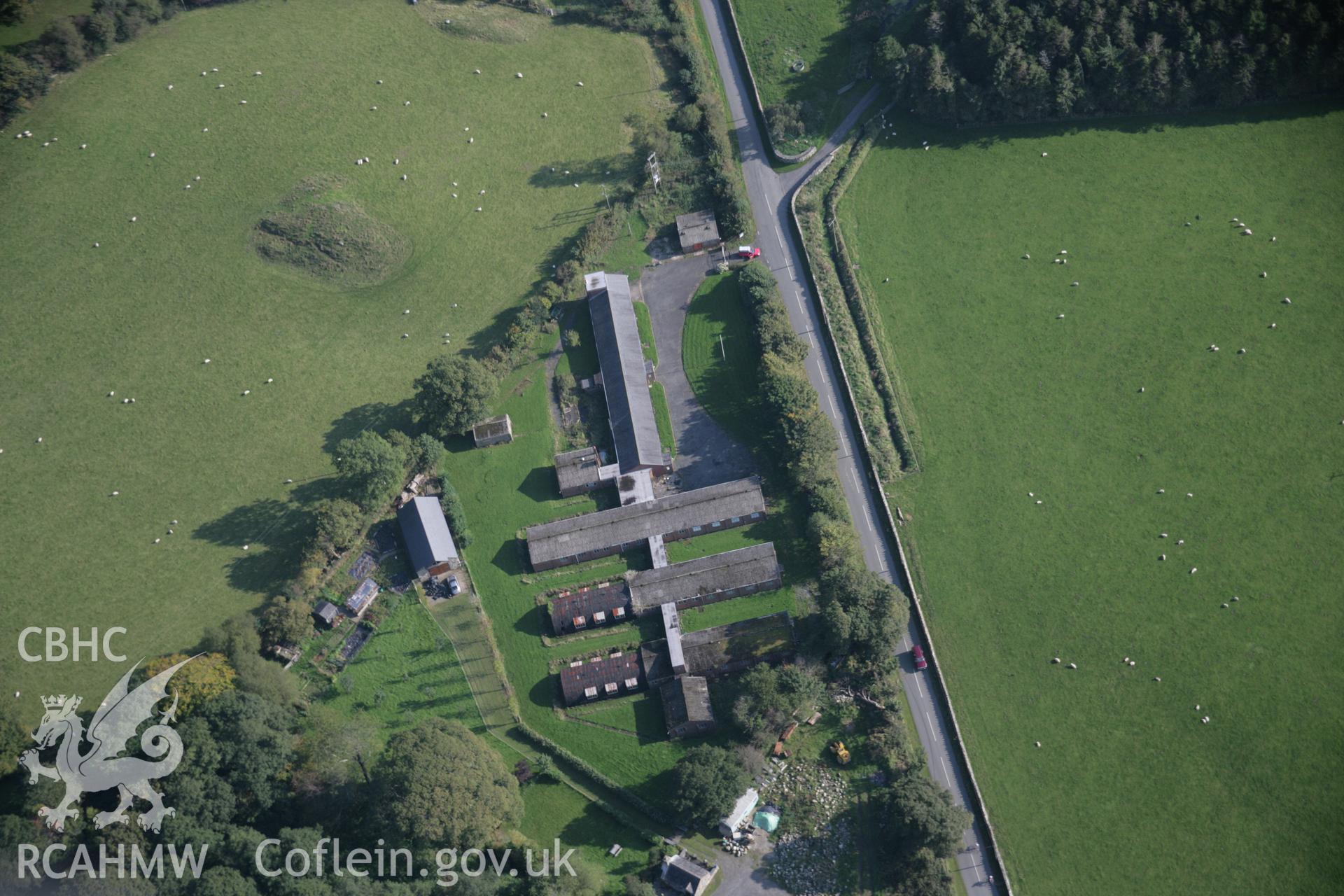 RCAHMW colour oblique aerial photograph of Peniarth Country House Garden and wartime sheds, Llanegryn, viewed looking to the south-east. Taken on 17 October 2005 by Toby Driver