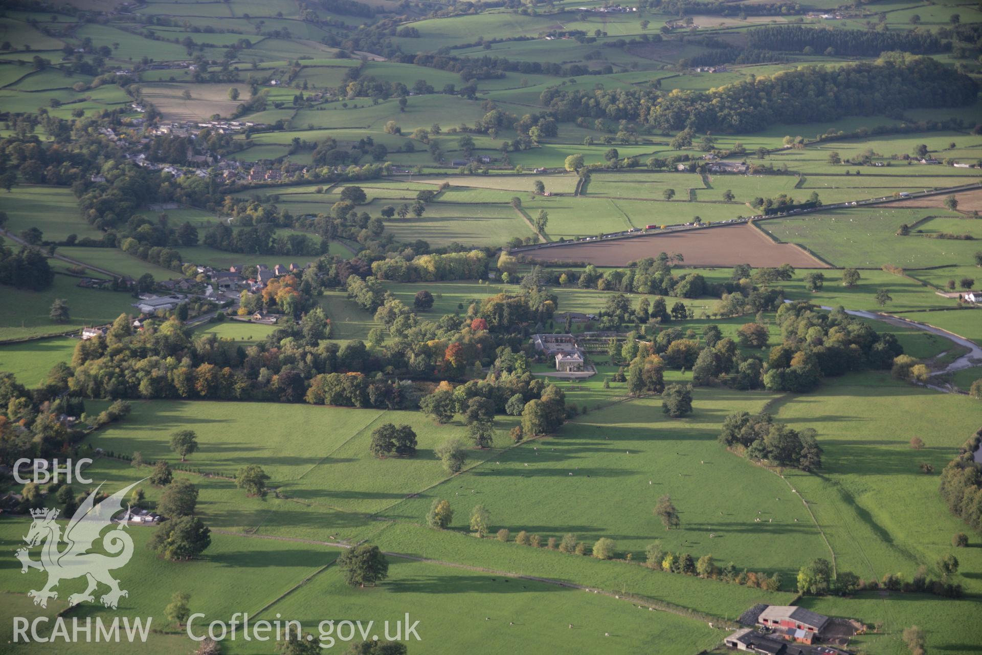 RCAHMW colour oblique aerial photograph of Glansevern Hall Garden, Berriew, with autumn colours, from the south. Taken on 13 October 2005 by Toby Driver