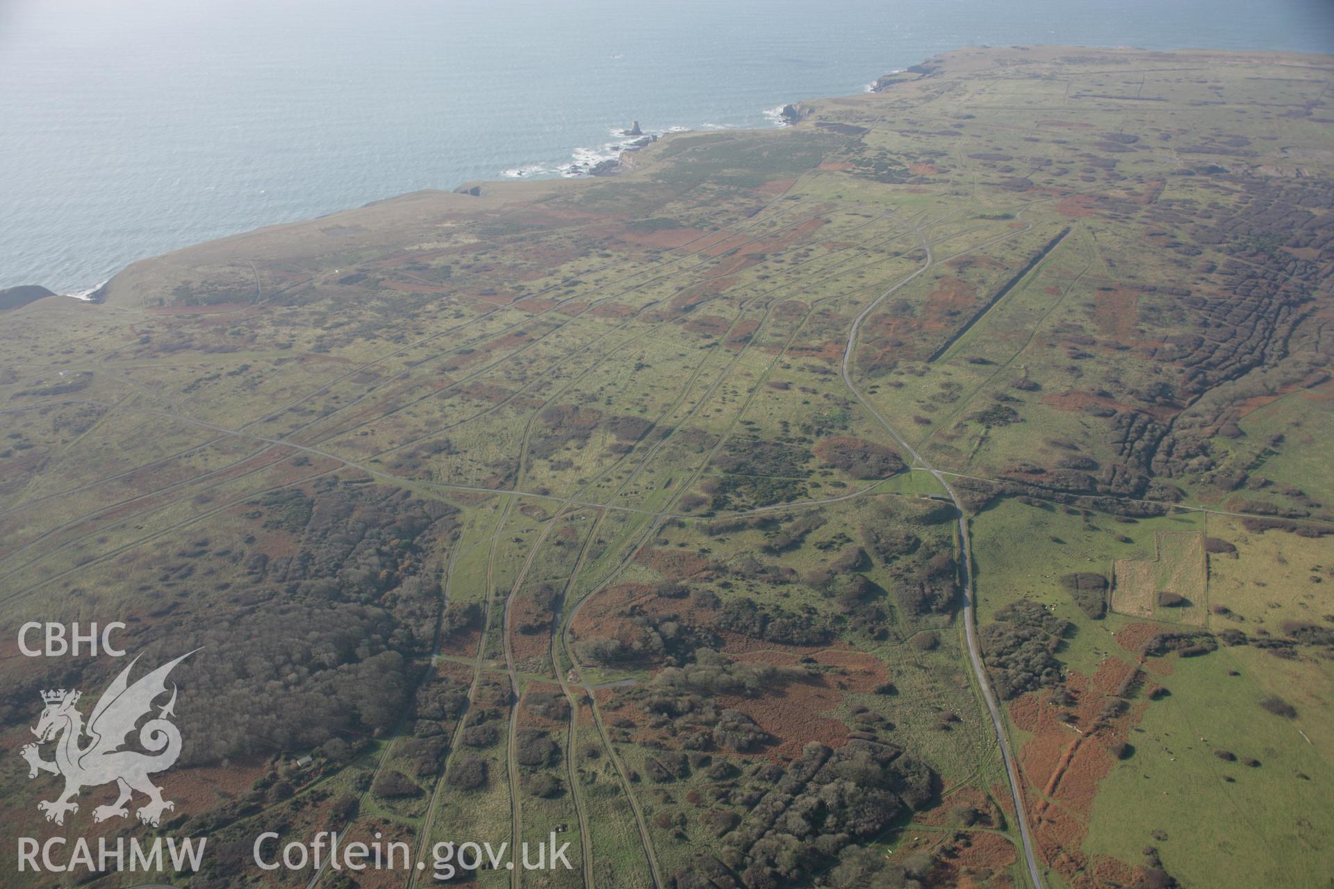 RCAHMW colour oblique aerial photograph of Castlemartin Training Area, showing the Mount Sion Cover, looking south-west. Taken on 19 November 2005 by Toby Driver