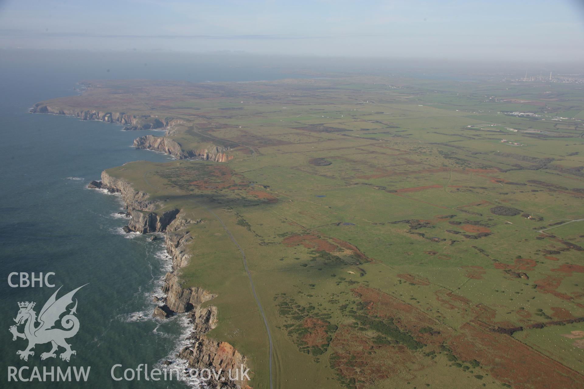 RCAHMW colour oblique aerial photograph of Castlemartin Training Area. A landscape view looking west over Crickmail Down. Taken on 19 November 2005 by Toby Driver