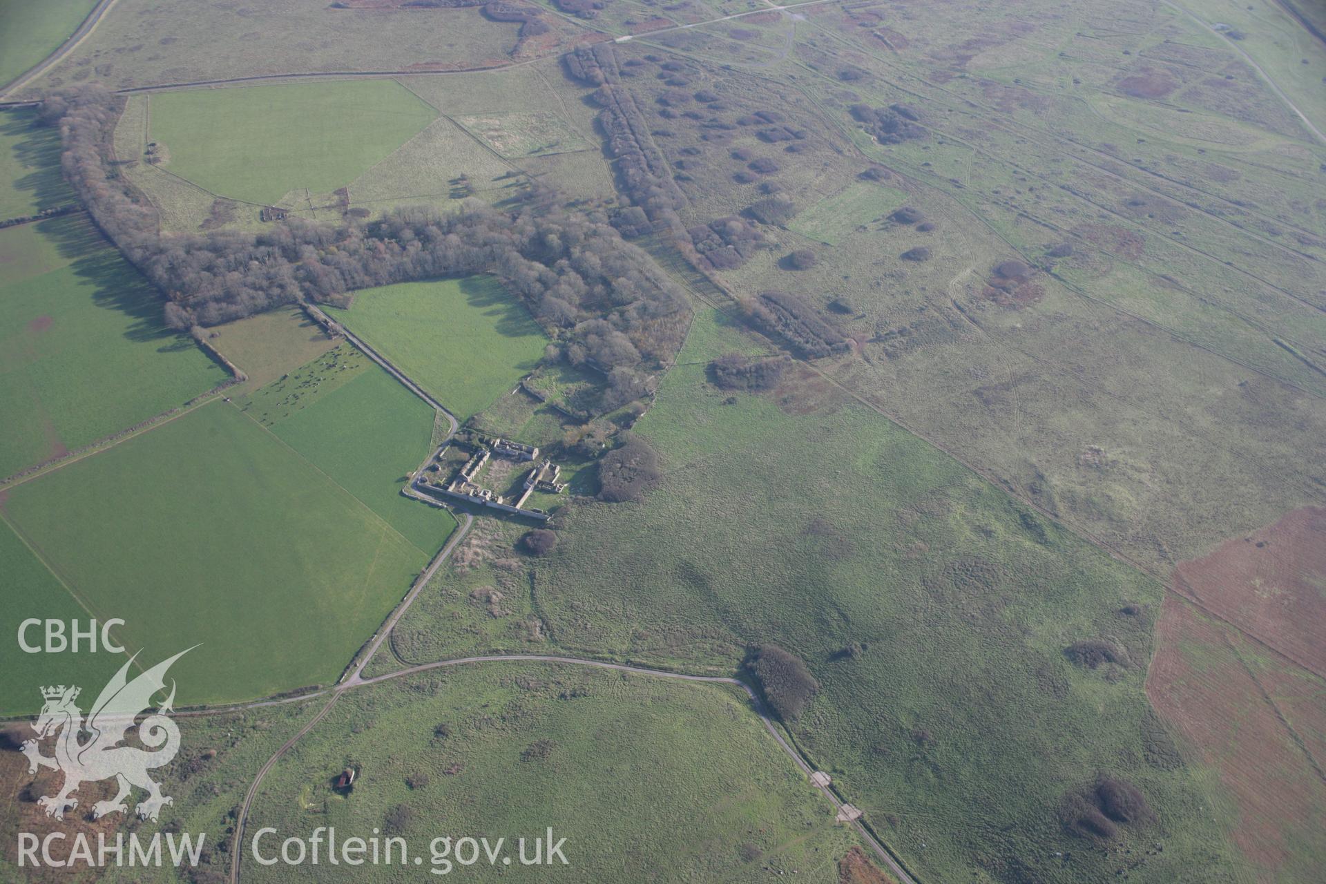 RCAHMW colour oblique aerial photograph of Brownslade Home Farm Complex. A wide landscape view from the north-west. Taken on 19 November 2005 by Toby Driver