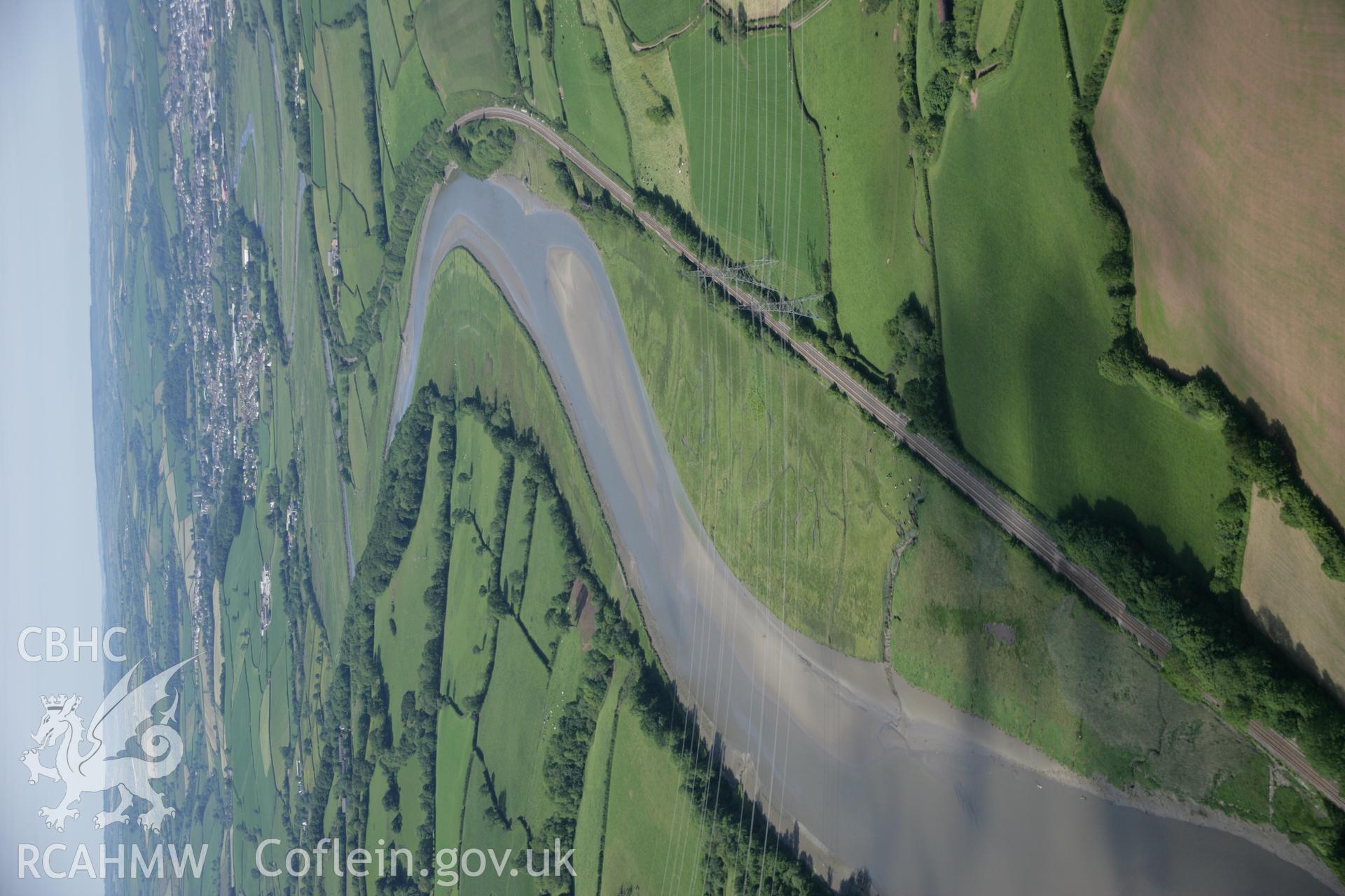 RCAHMW colour oblique aerial photograph showing landscape view of Afon Twyi, looking north to Carmarthen. Taken on 09 June 2005 by Toby Driver