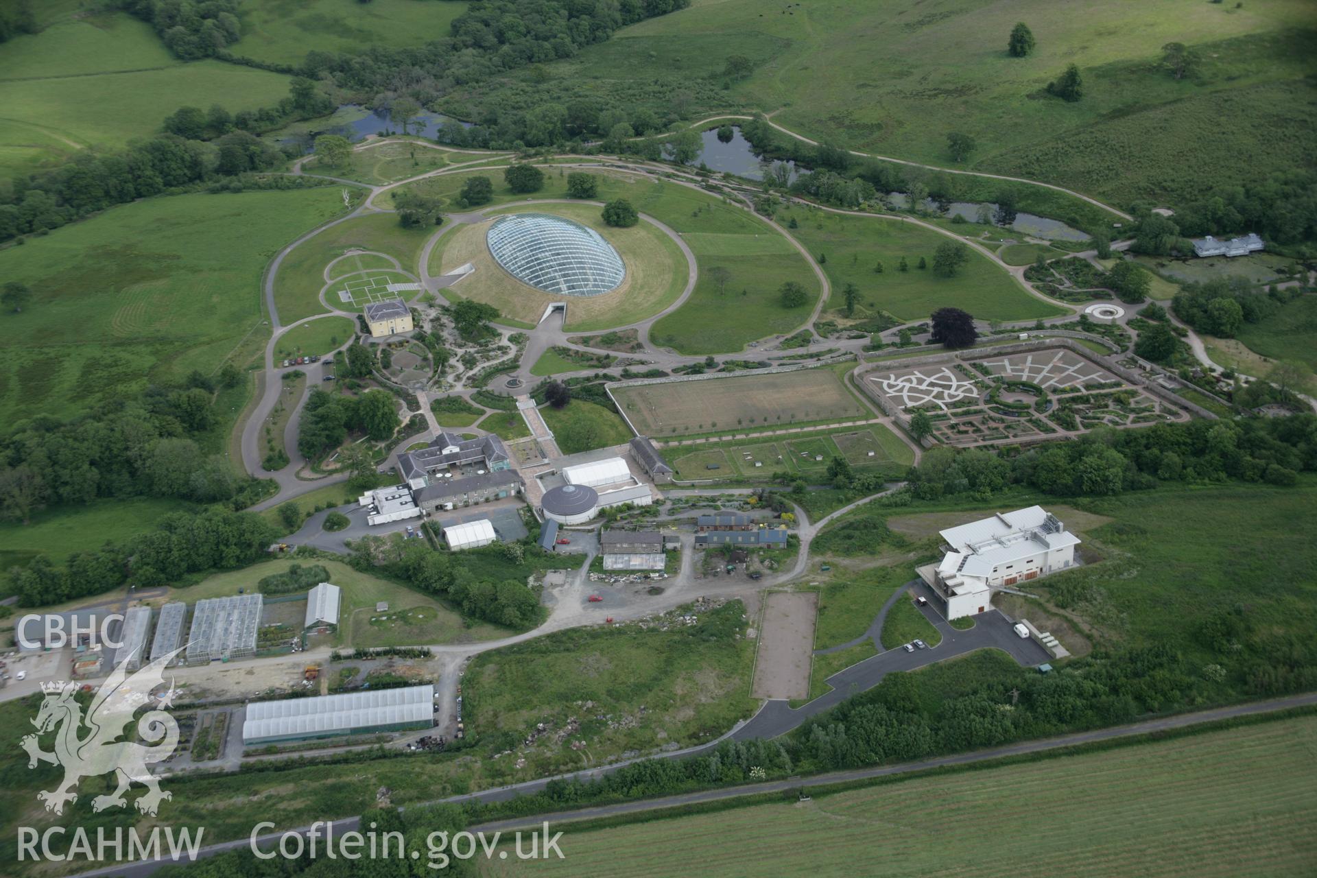 RCAHMW colour oblique aerial photograph of Middleton Hall Park, now the National Botanic Garden of Wales, general view from the north-west. Taken on 09 June 2005 by Toby Driver