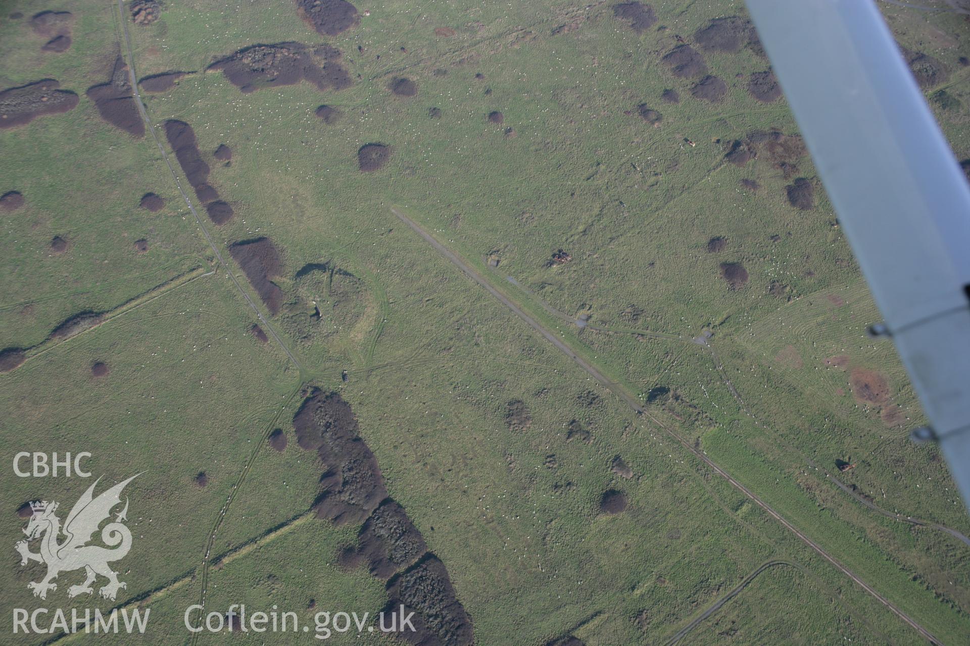 RCAHMW colour oblique aerial photograph of an unlocated bunker on Castlemartin Training Area. Taken on 19 November 2005 by Toby Driver