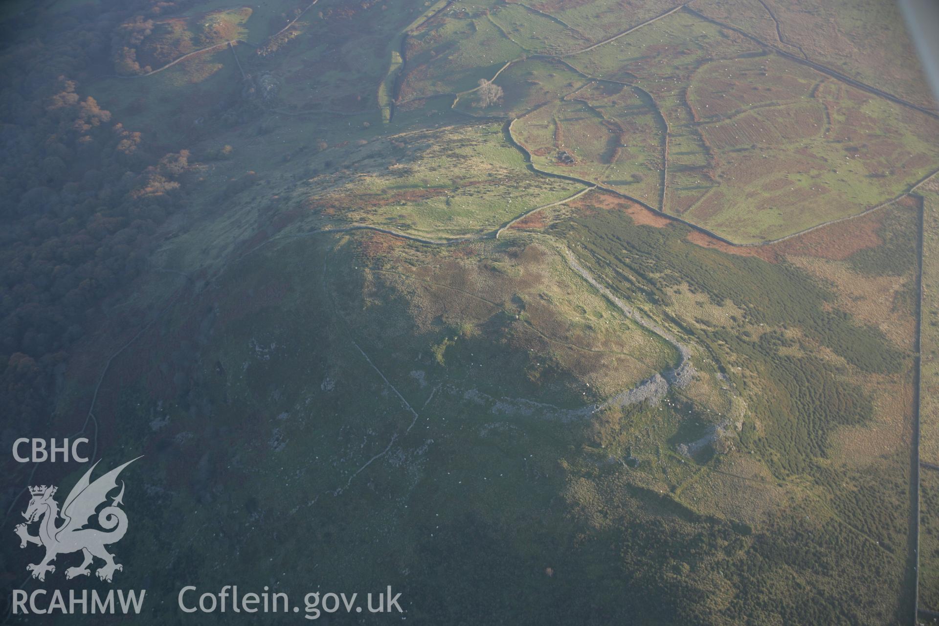 RCAHMW colour oblique aerial photograph of Pen-y-Gaer Hillfort, viewed from the north-west. Taken on 21 November 2005 by Toby Driver