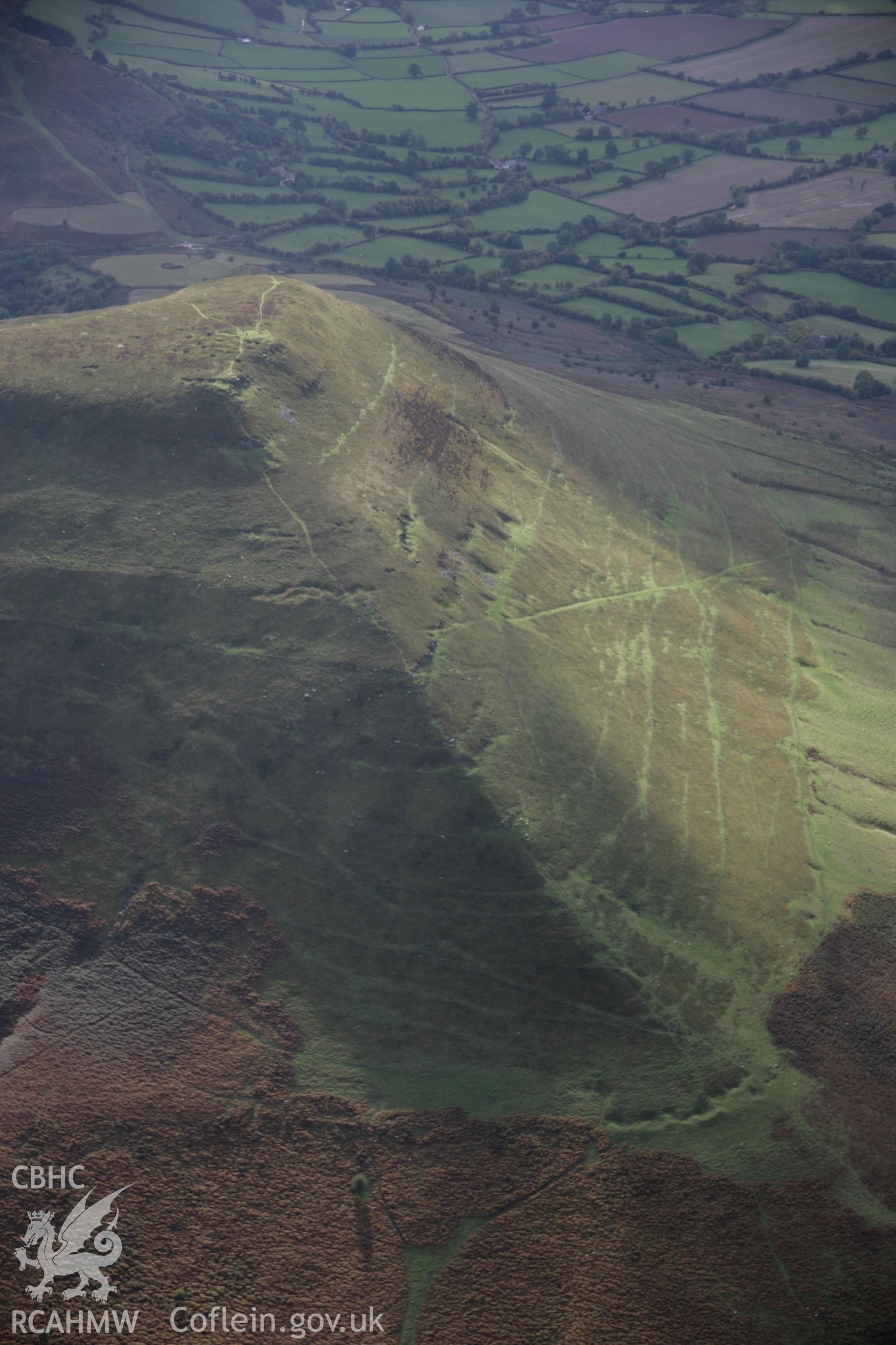 RCAHMW colour oblique aerial photograph of Mynydd Troed Quarries, viewed looking to the south-west. Taken on 13 October 2005 by Toby Driver