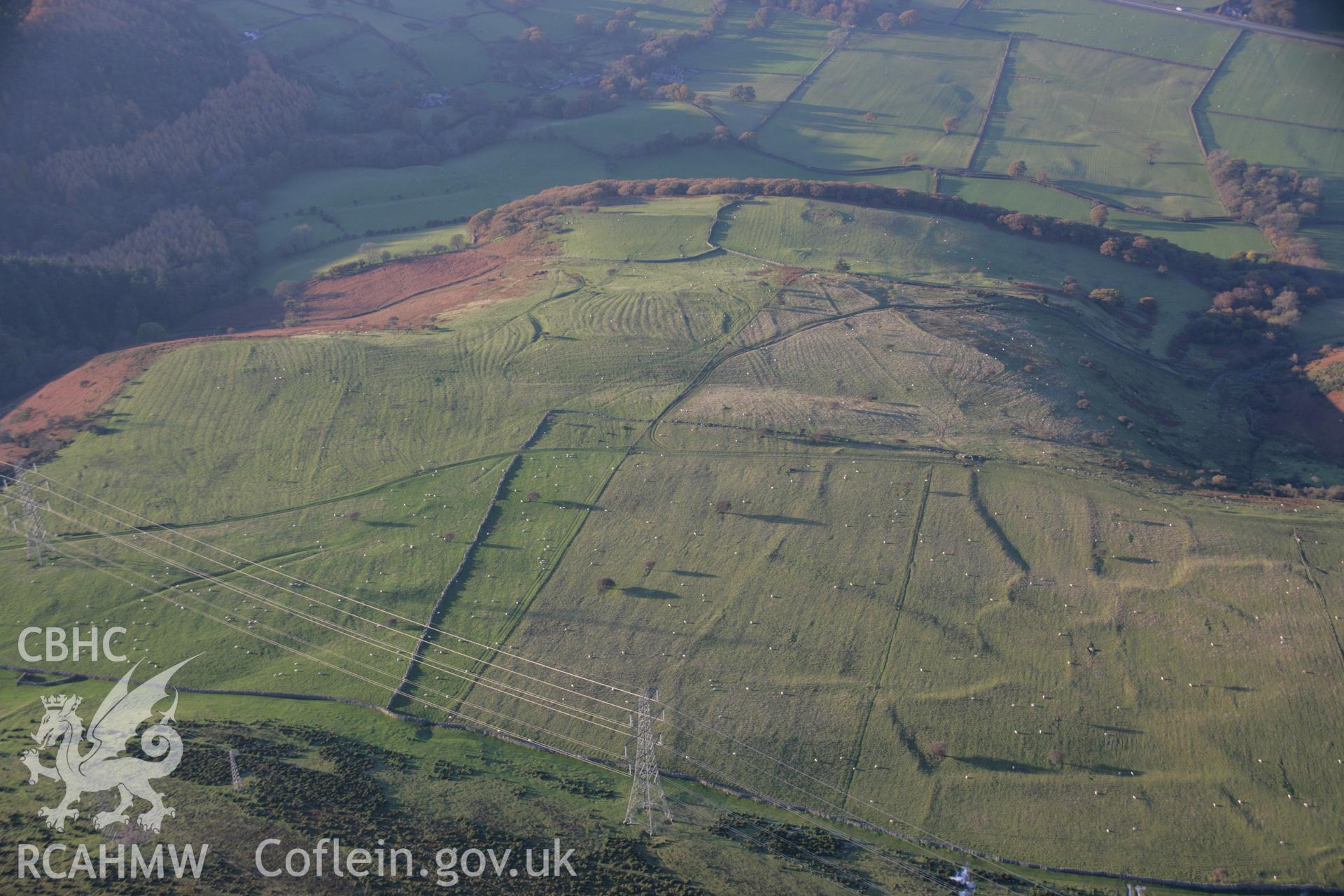 RCAHMW colour oblique aerial photograph of Ffridd Ddu Field System from the south-west. Taken on 21 November 2005 by Toby Driver