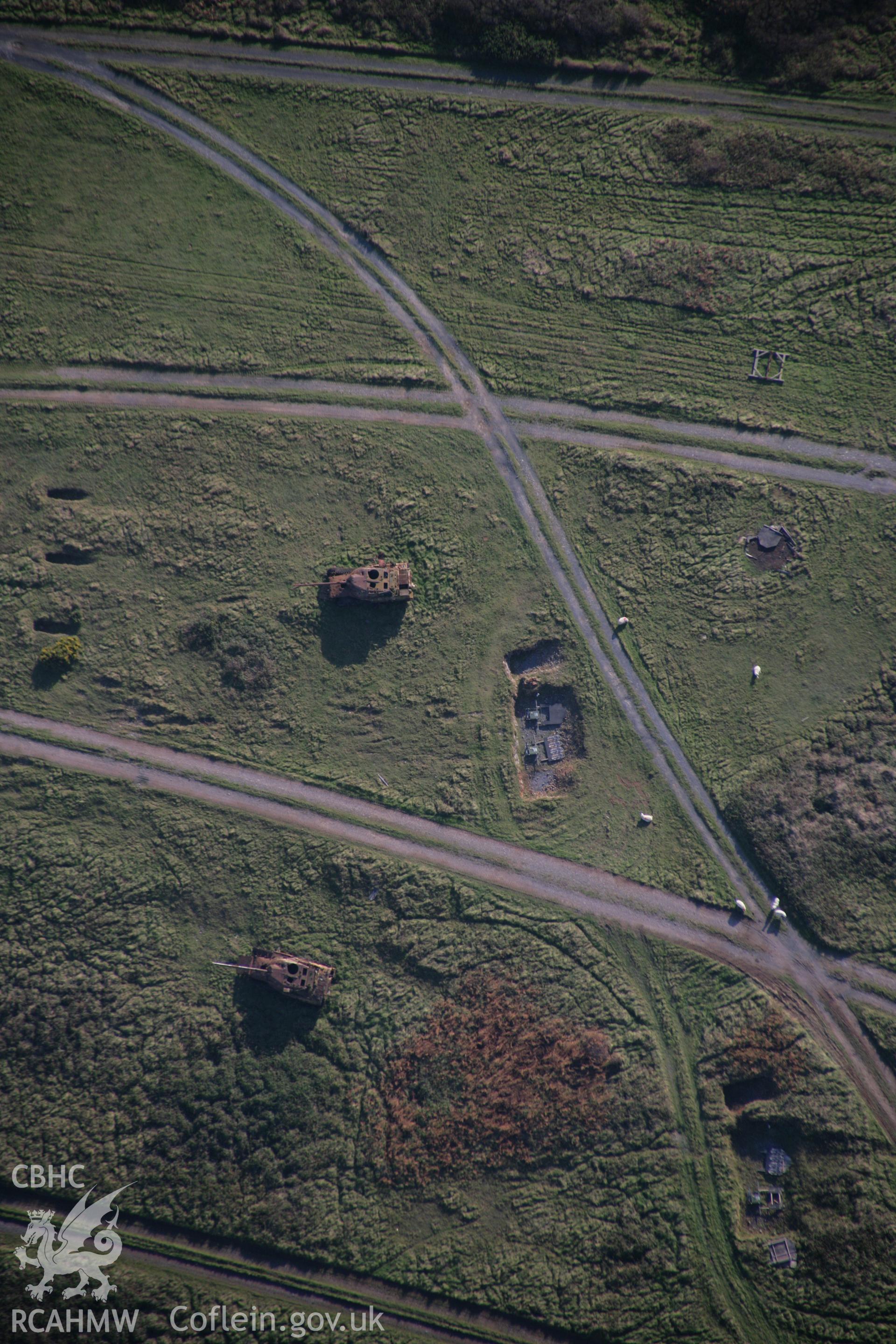 RCAHMW colour oblique aerial photograph of tank 'hard' targets at Mount Sion Covert in the Castlemartin Training Area, viewed from the north. Taken on 19 November 2005 by Toby Driver