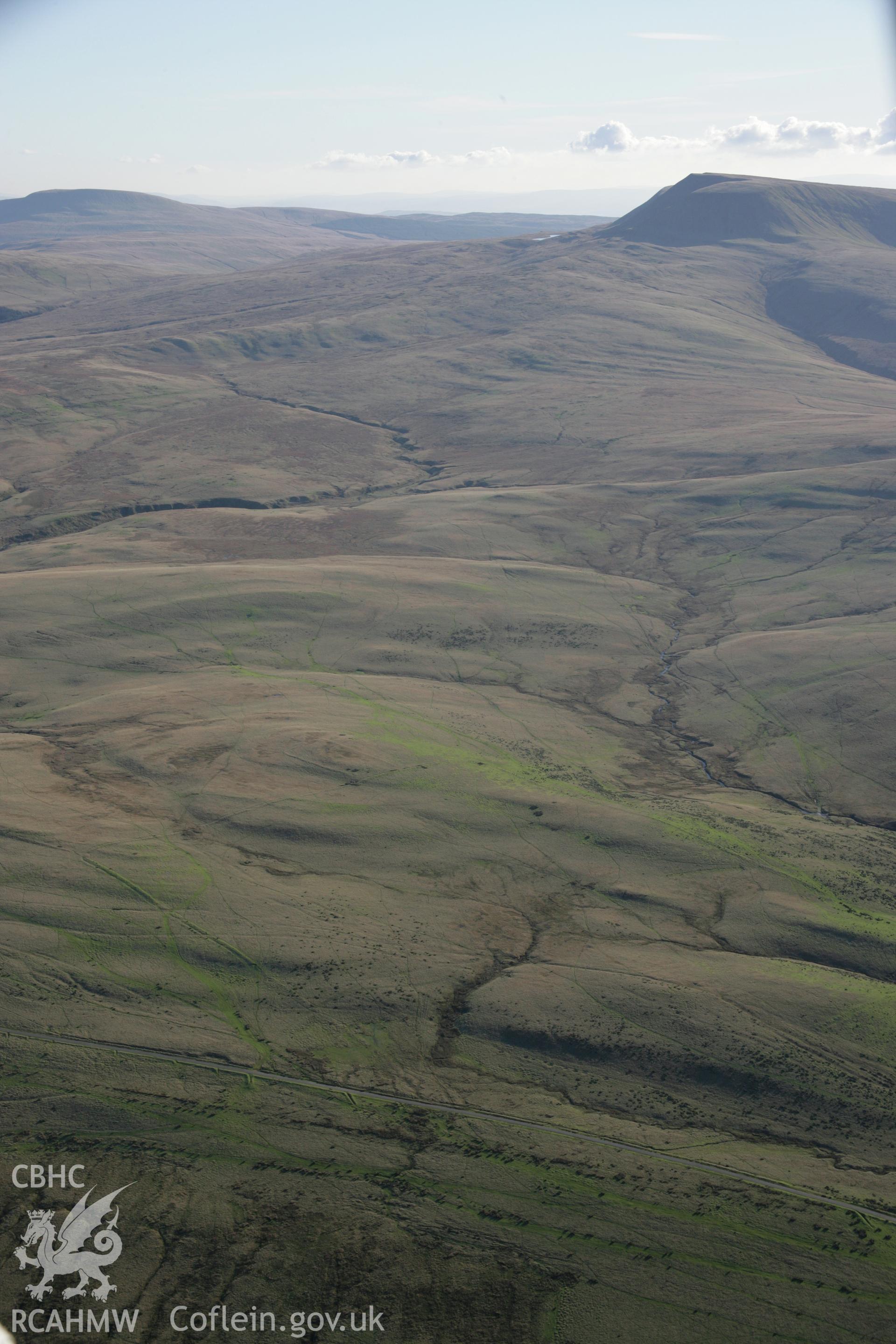 RCAHMW colour oblique photograph of Arhosfa'r Garreg Lwyd, Roman marching camp, view looking south. Taken by Toby Driver on 17/11/2005.
