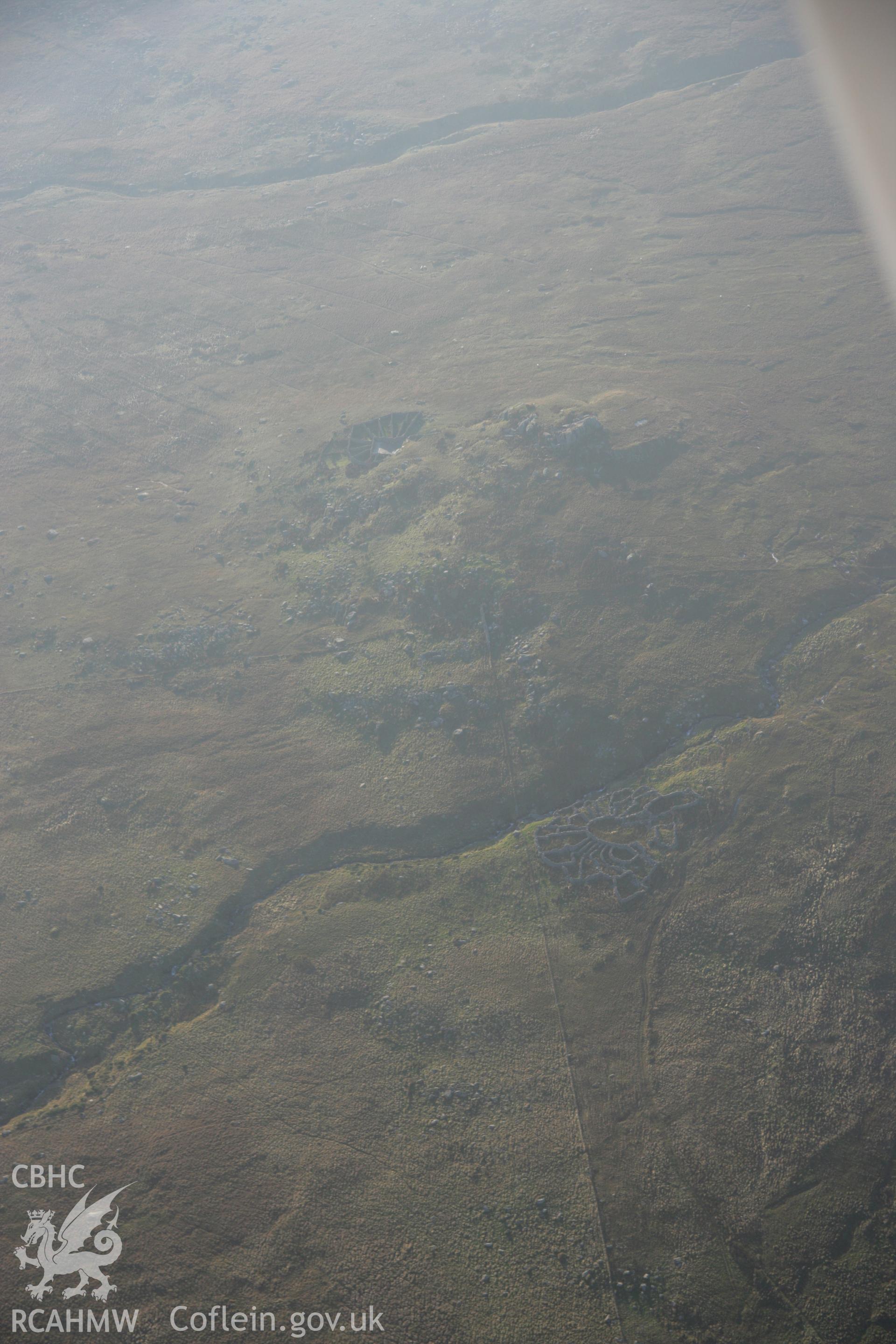 RCAHMW colour oblique aerial photograph of Afon Garreg Wen Sheepfold. A misty view from the north-east. Taken on 21 November 2005 by Toby Driver