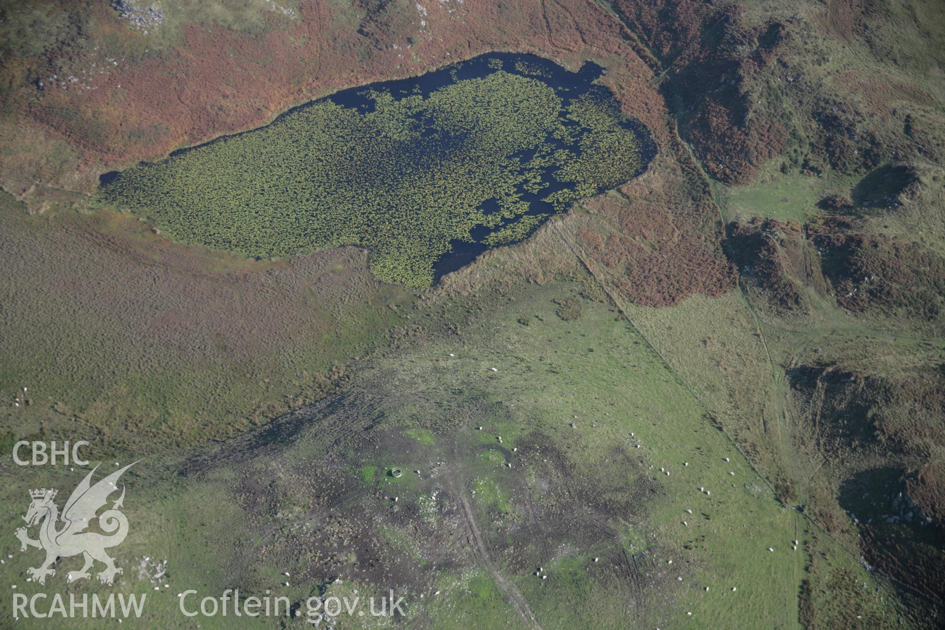 RCAHMW colour oblique aerial photograph of Llyn Barfog (the Bearded Lake), Mynydd y Llyn with cairn viewed from the north-west. Taken on 17 October 2005 by Toby Driver