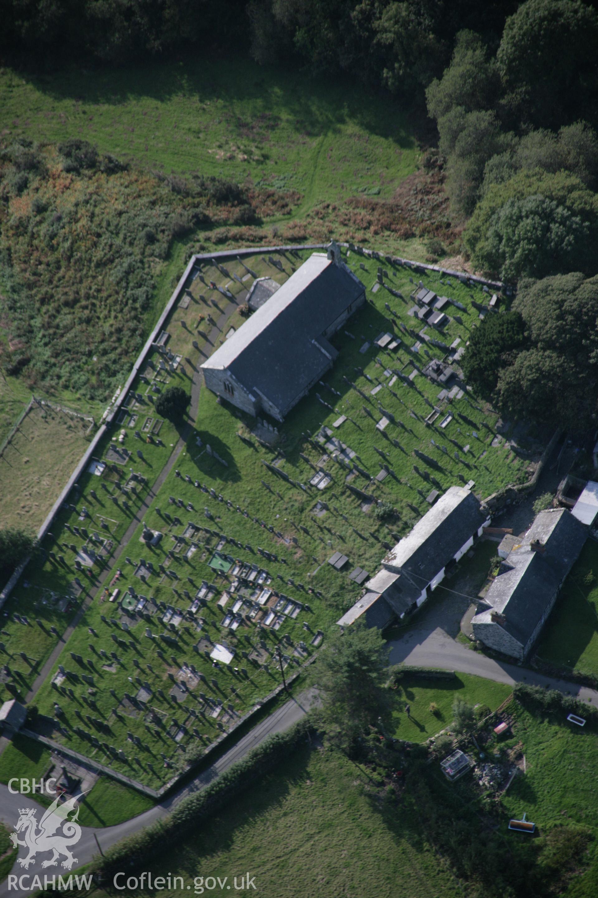 RCAHMW colour oblique aerial photograph of St Mary and St Egryn's Church, Llanegryn, from the east. Taken on 17 October 2005 by Toby Driver