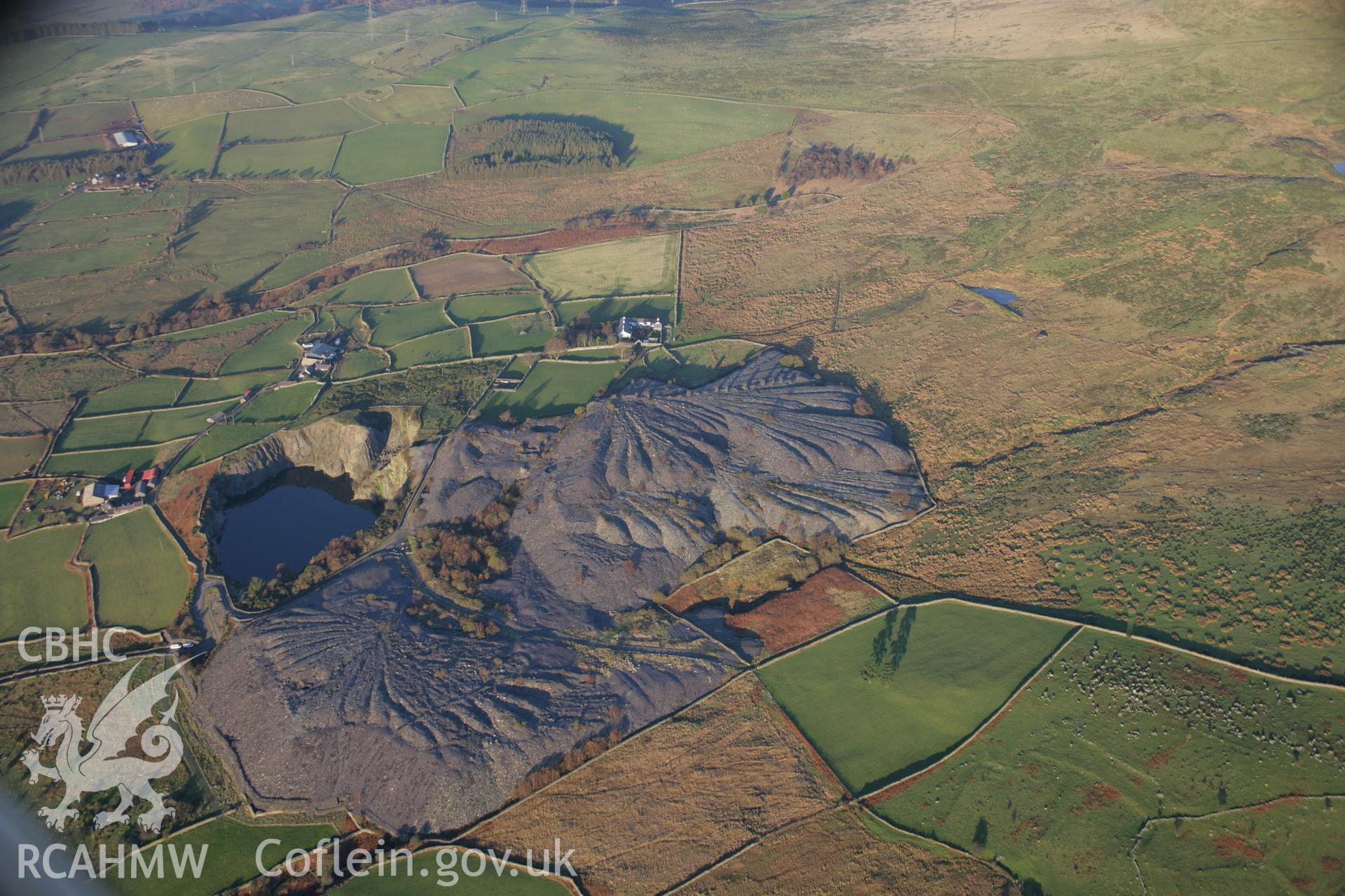 RCAHMW colour oblique aerial photograph of Bryn Hafod-y-Wern Slate Quarry from the south-east. Taken on 21 November 2005 by Toby Driver