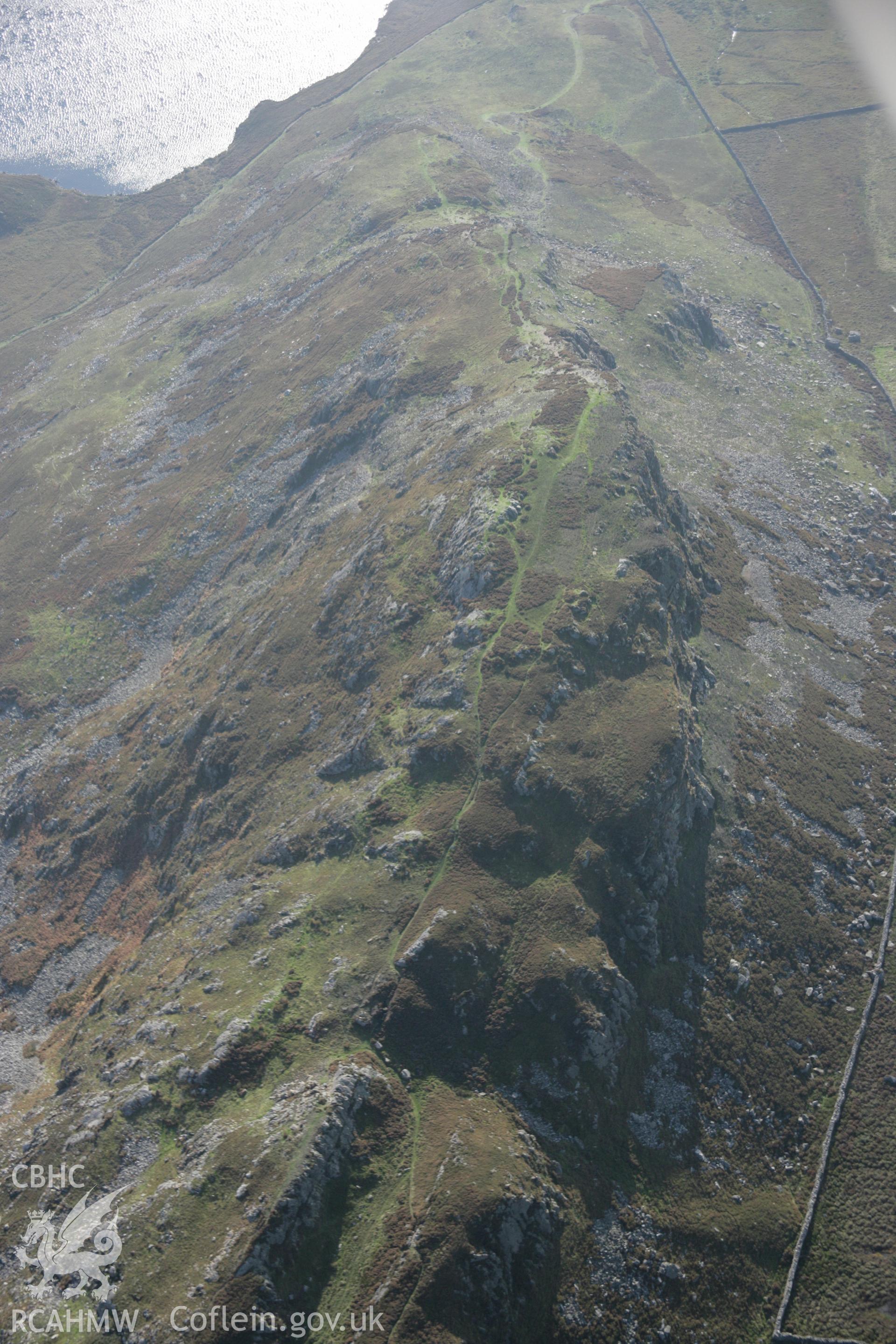 RCAHMW colour oblique aerial photograph of Pared-y-Cefn Hir Hillfort, viewed looking towards the south-west. Taken on 17 October 2005 by Toby Driver