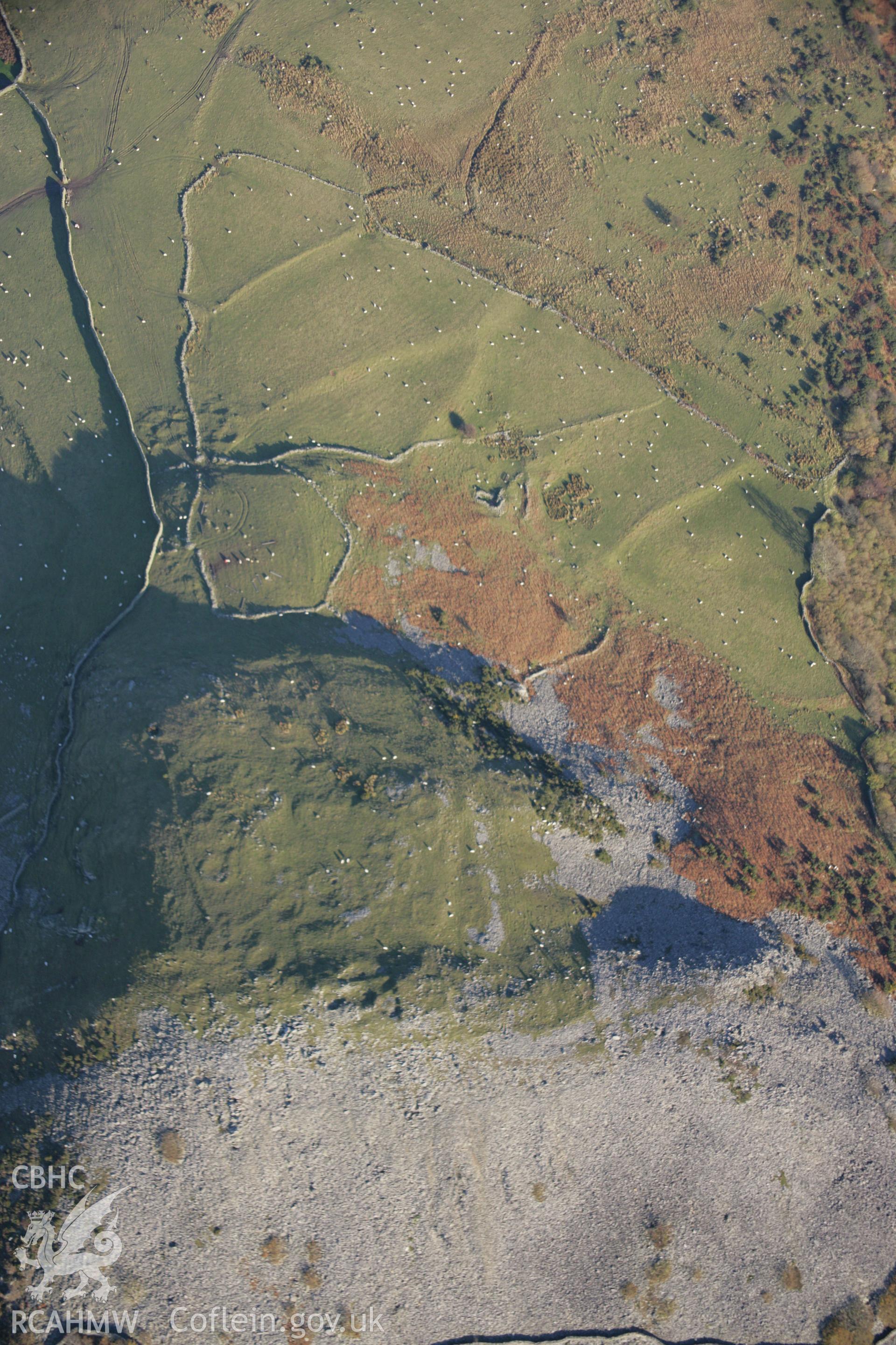 RCAHMW colour oblique aerial photograph of Dinas Hillfort, Llanfairfechan, from the south-west. Taken on 21 November 2005 by Toby Driver