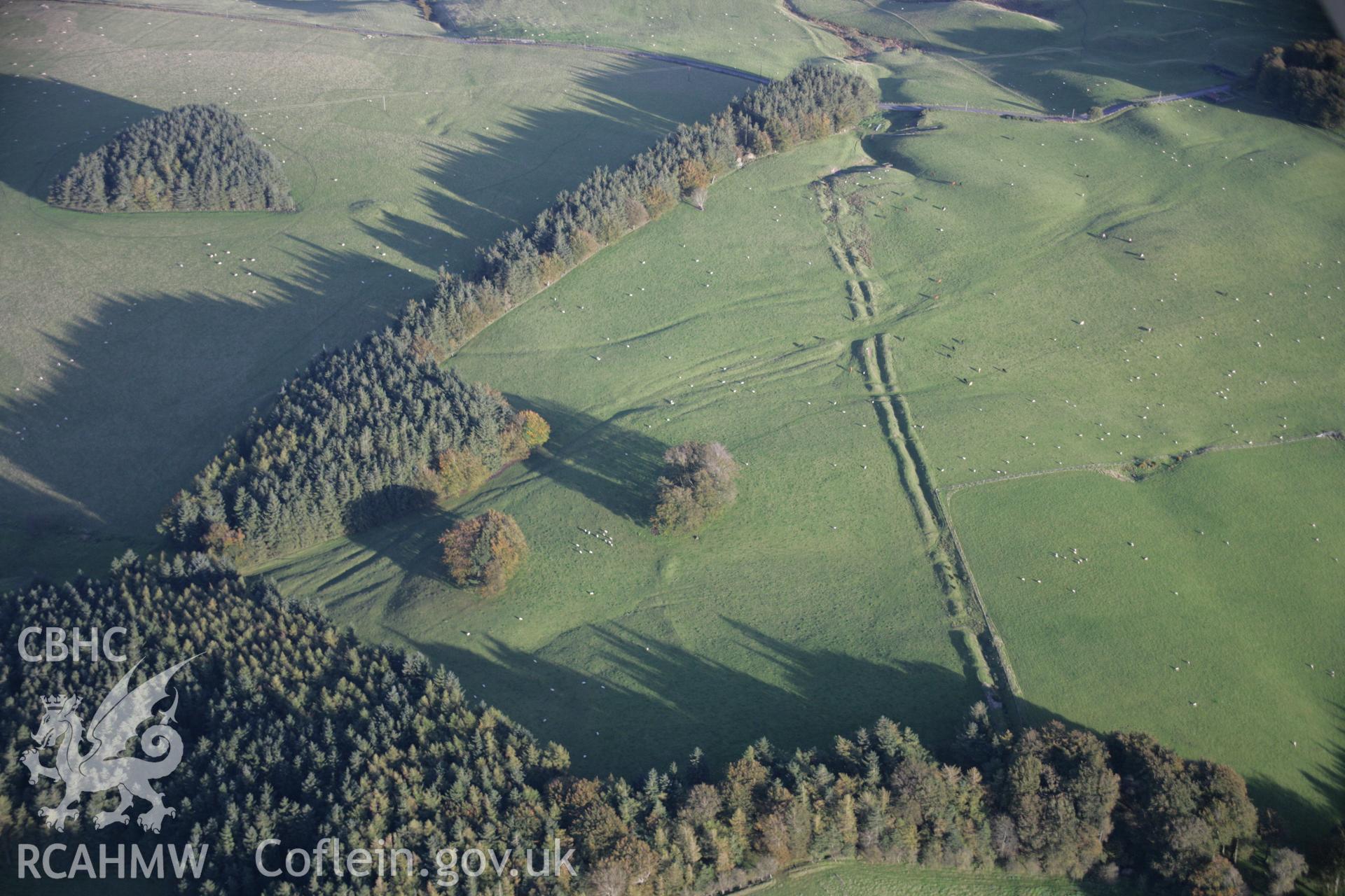 RCAHMW colour oblique aerial photograph of Crugyn Bank Dyke from the north-west. Taken on 13 October 2005 by Toby Driver