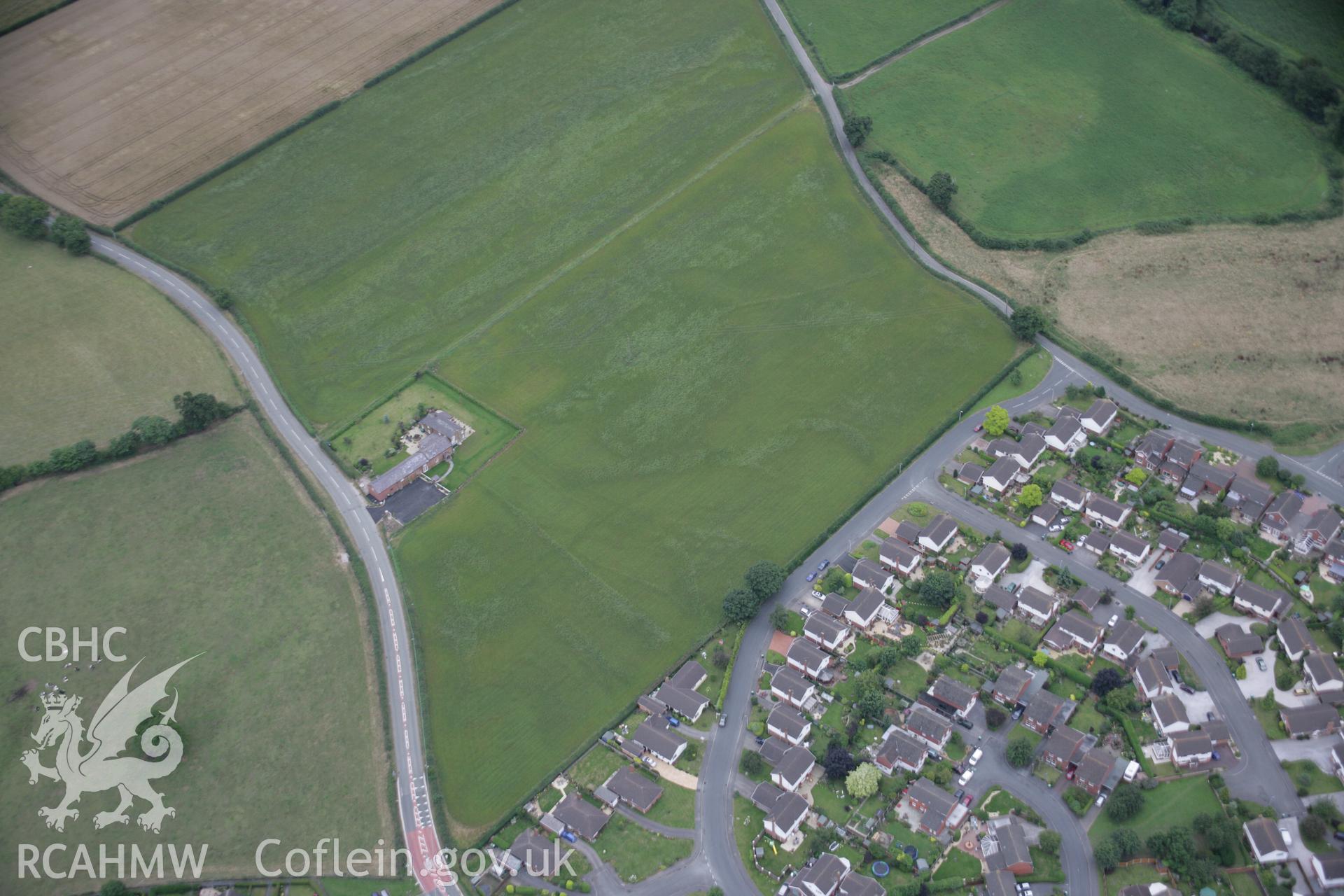 RCAHMW digital colour oblique photograph of Lane Farm, Rossett, viewed from the west. Taken on 01/08/2005 by T.G. Driver.