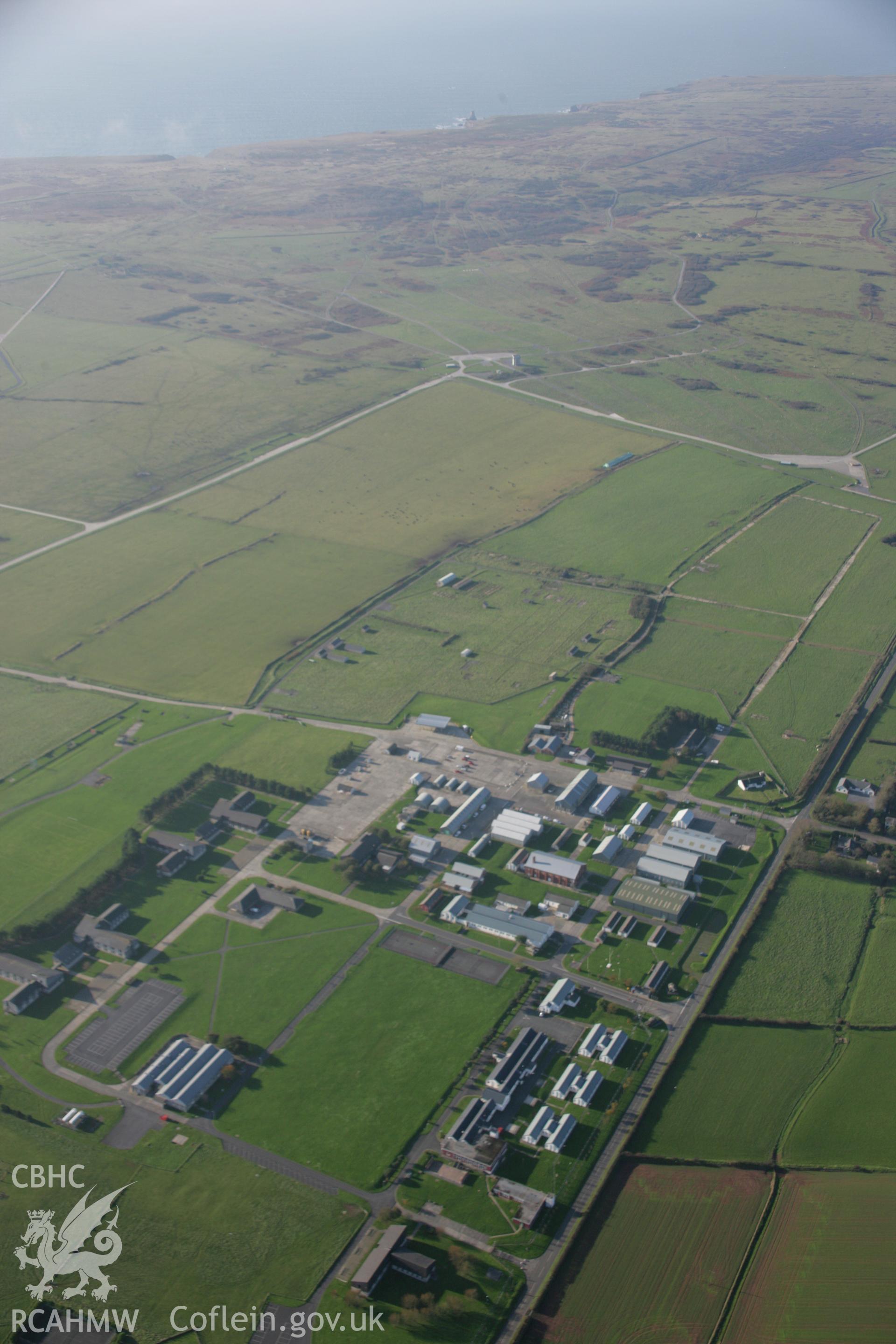 RCAHMW colour oblique aerial photograph of Merrion Camp defended enclosure, Castlemartin Training Area, viewed from the north-east. Taken on 19 November 2005 by Toby Driver