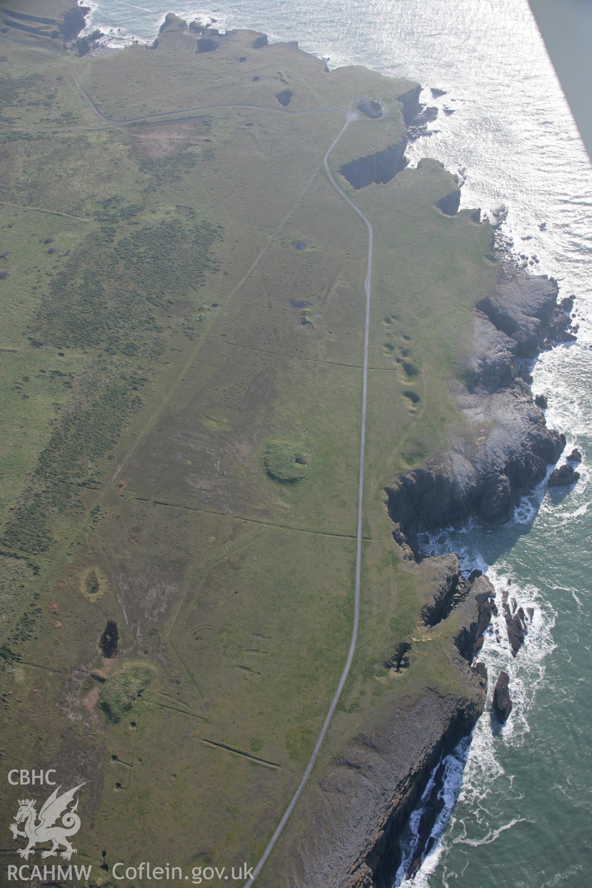 RCAHMW colour oblique aerial photograph of Castlemartin Training Area looking south showing bunkers on Linney Down. Taken on 19 November 2005 by Toby Driver