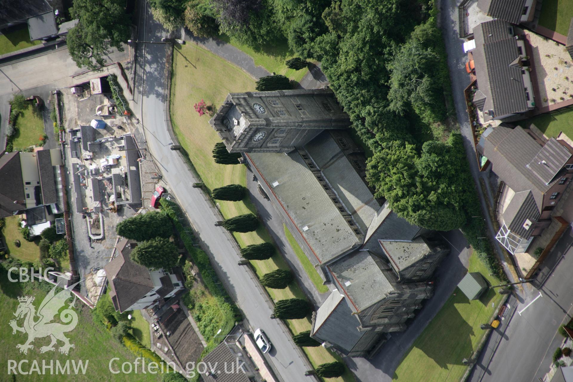 RCAHMW colour oblique aerial photograph of All Saints' Church, Brynmawr Avenue, Ammanford viewed from the north-west. Taken on 09 June 2005 by Toby Driver