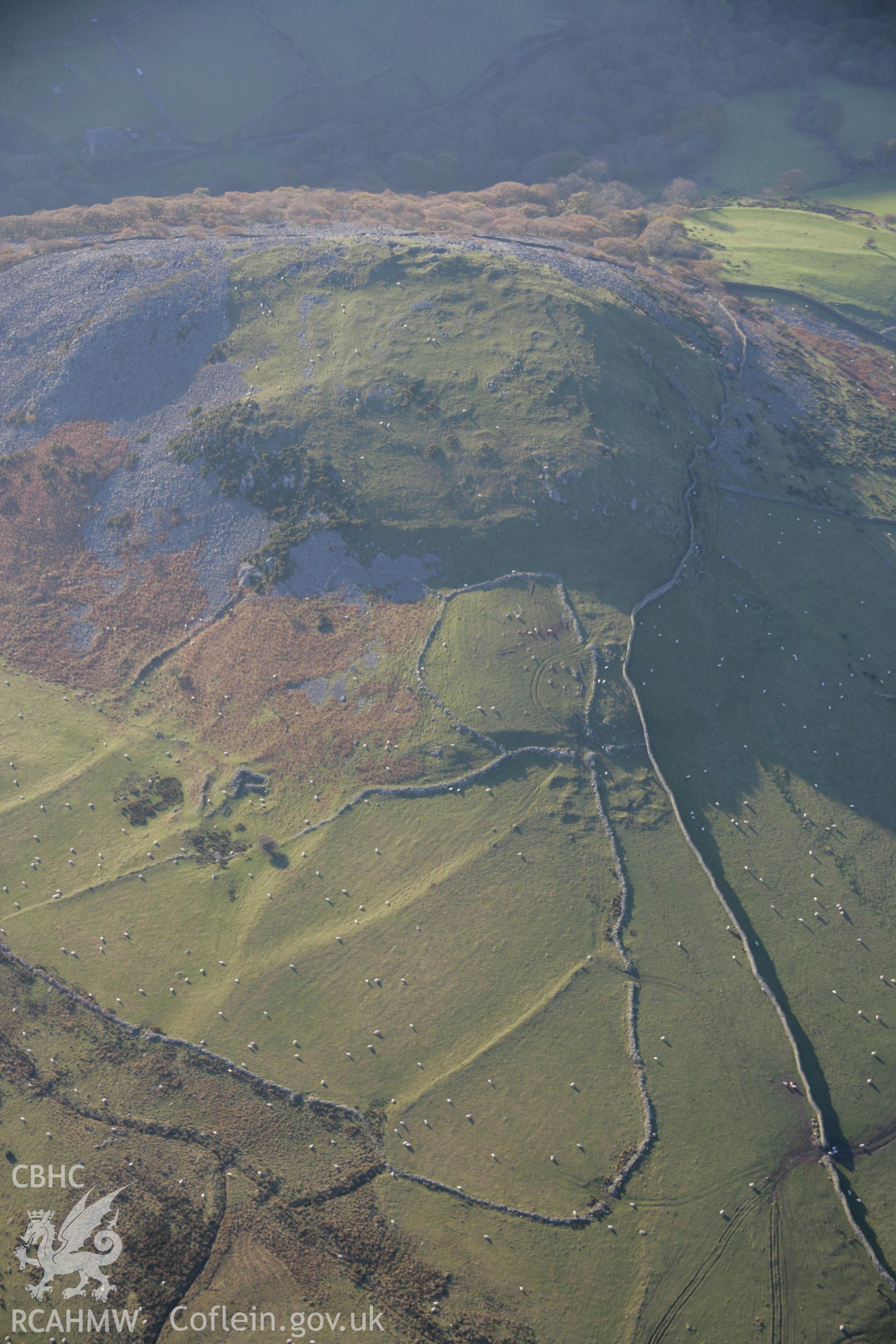 RCAHMW colour oblique aerial photograph of Dinas, Llanfairfechan, from the north-east. Taken on 21 November 2005 by Toby Driver