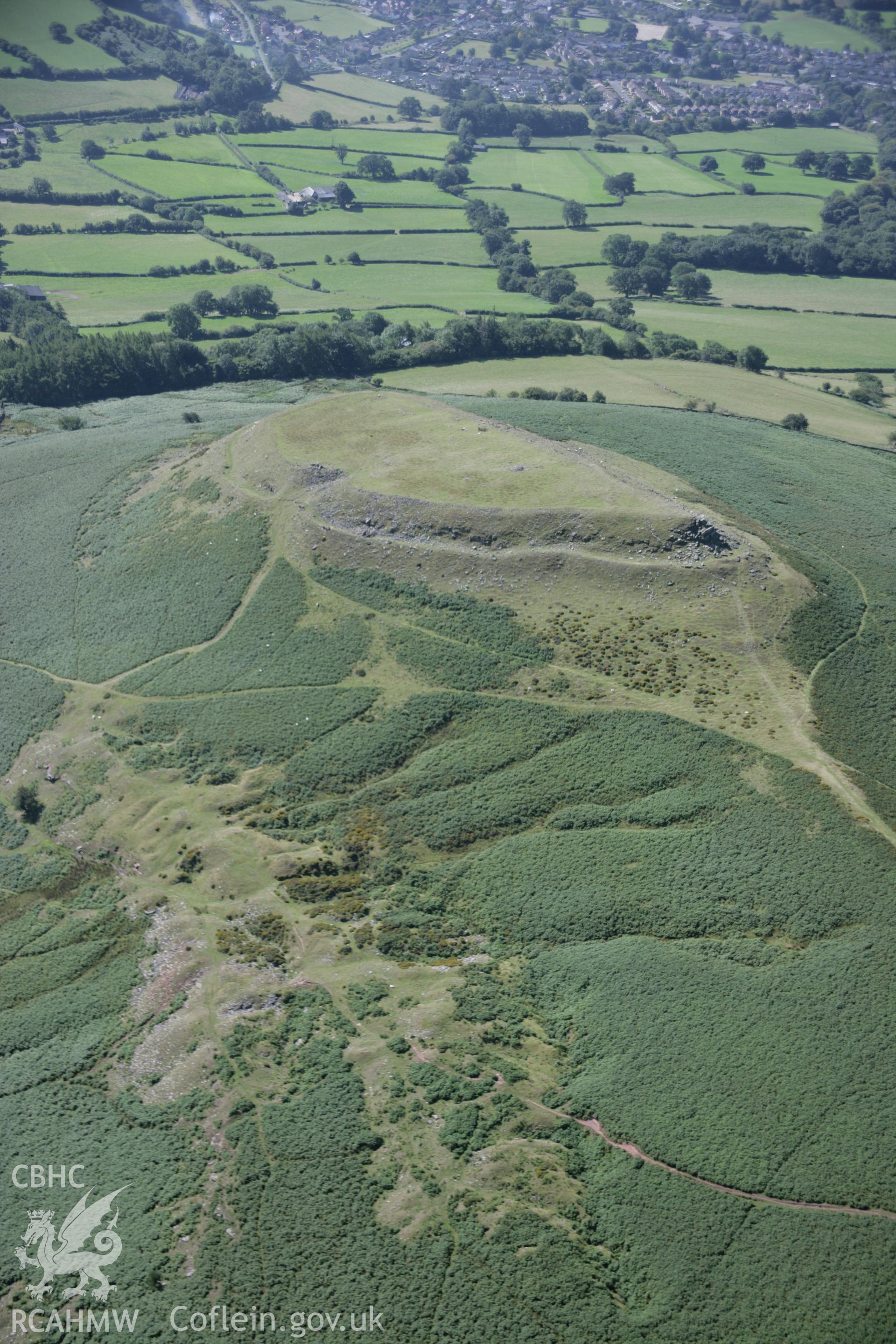 RCAHMW digital colour oblique photograph of Crug Hywel Hillfort viewed from the north. Taken on 02/09/2005 by T.G. Driver.