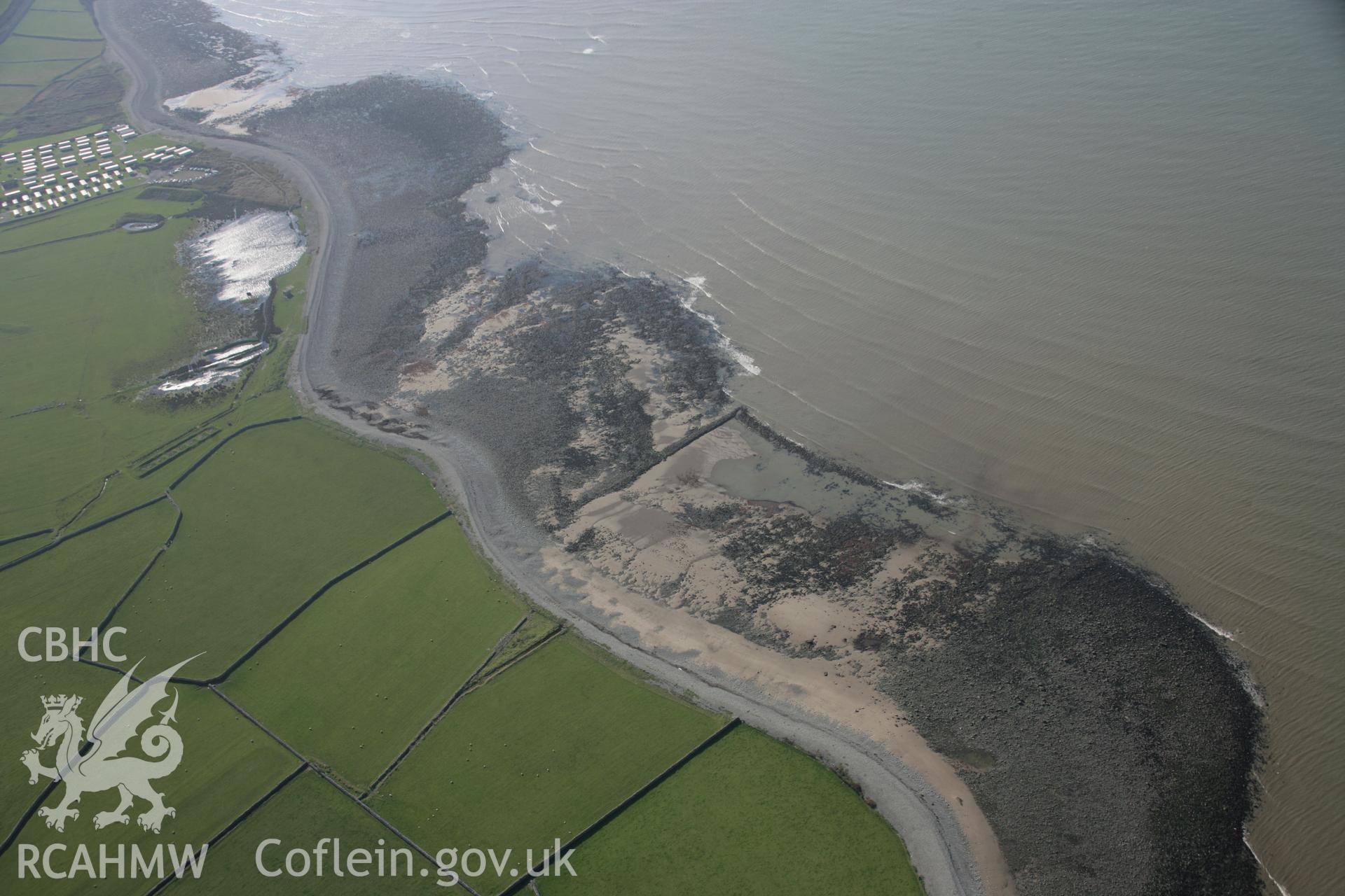 RCAHMW colour oblique aerial photograph of Llwyngwril Fish Trap I, shown in wide view from the north-east. Taken on 17 October 2005 by Toby Driver