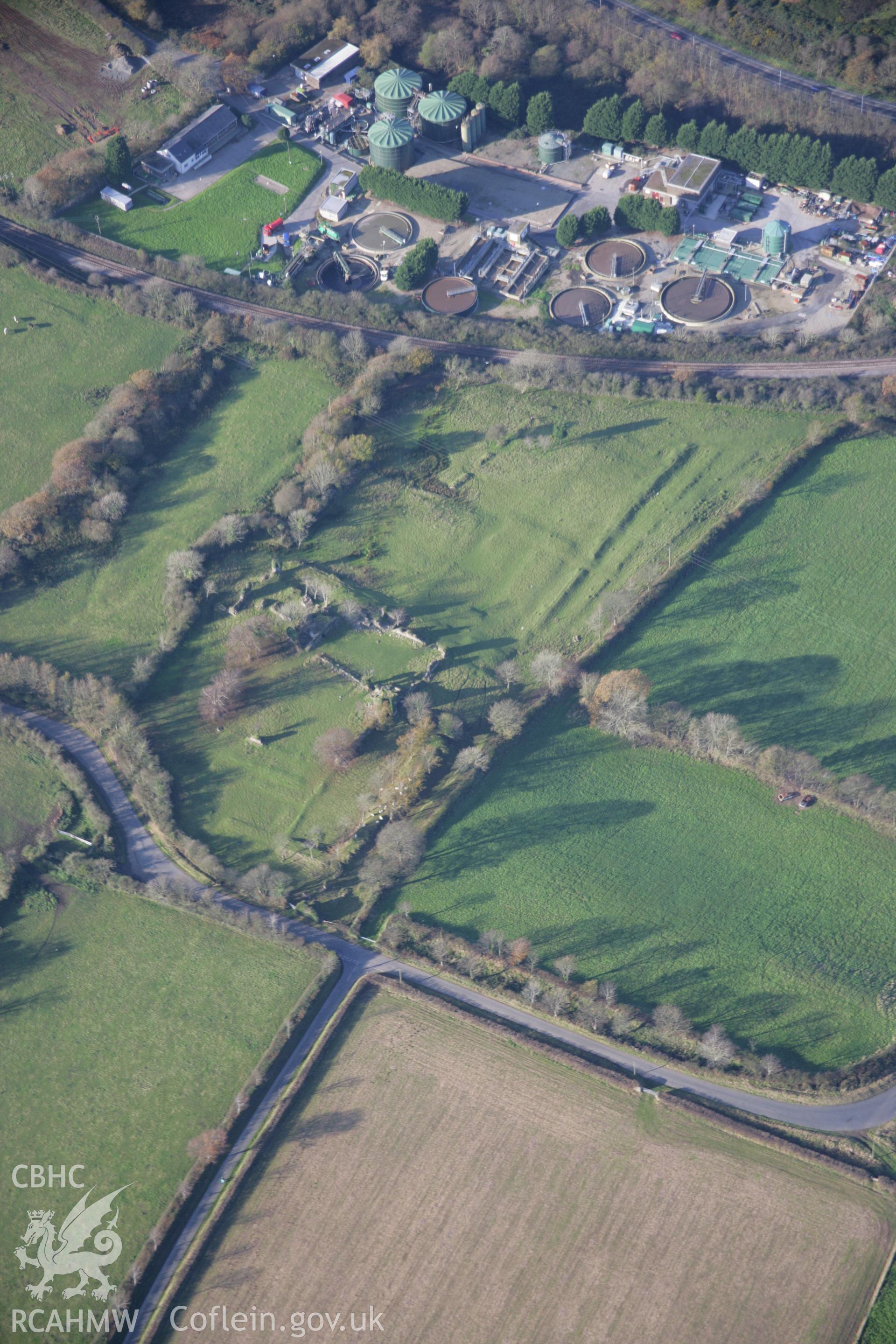 RCAHMW colour oblique aerial photograph of Haroldston House Garden Earthworks, Haverfordwest, in winter with low light looking north-west. Taken on 19 November 2005 by Toby Driver