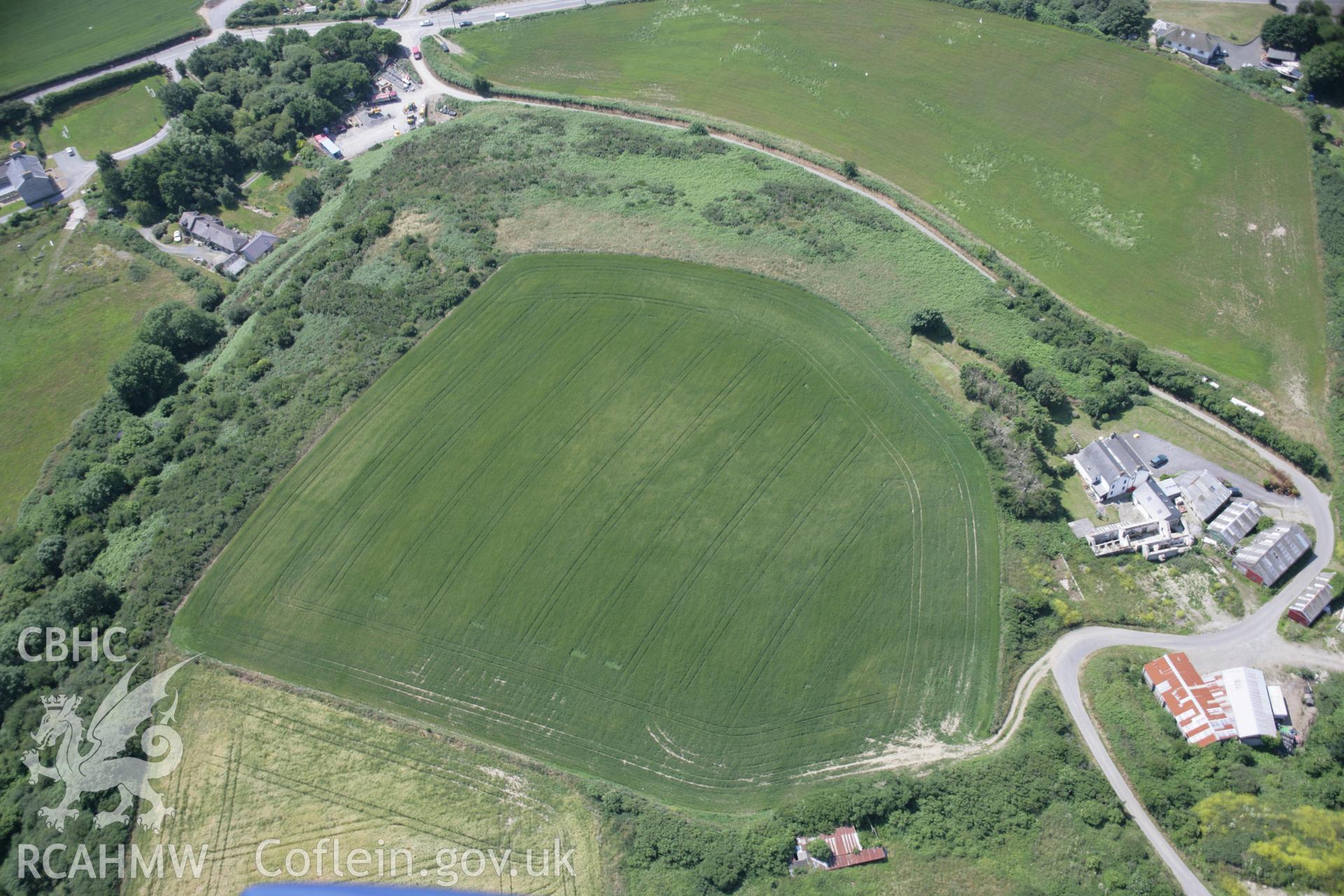 RCAHMW colour oblique aerial photograph of Waungelod Cropmark Enclosure. Taken on 11 July 2005 by Toby Driver