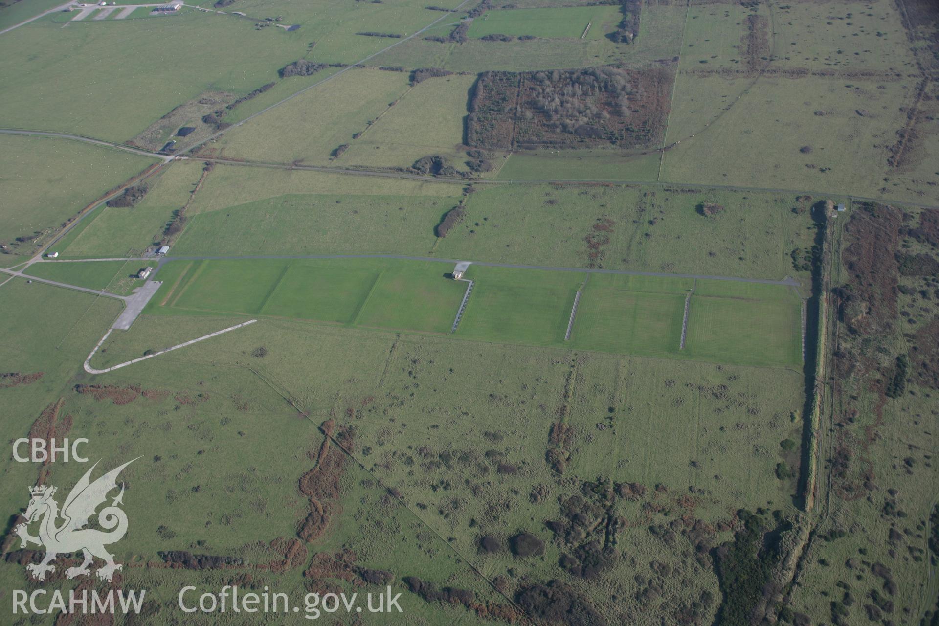 RCAHMW colour oblique aerial photograph of Longstone Down on the Castlemartin Training Area. A view looking east over the modern firing range. Taken on 19 November 2005 by Toby Driver