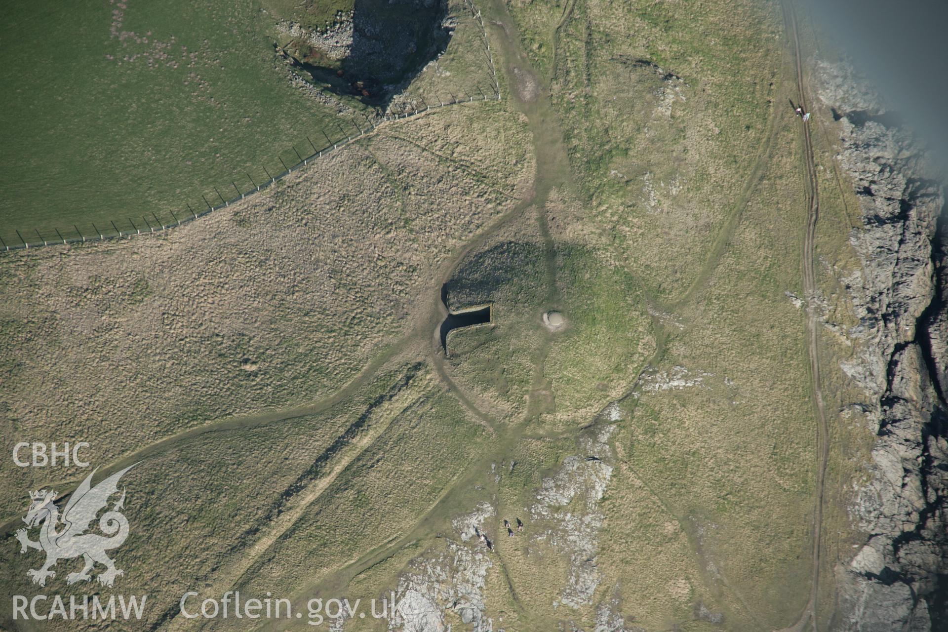 RCAHMW digital colour oblique photograph of Barclodiad-y-gawres Burial Chamber. Taken on 20/03/2005 by T.G. Driver.