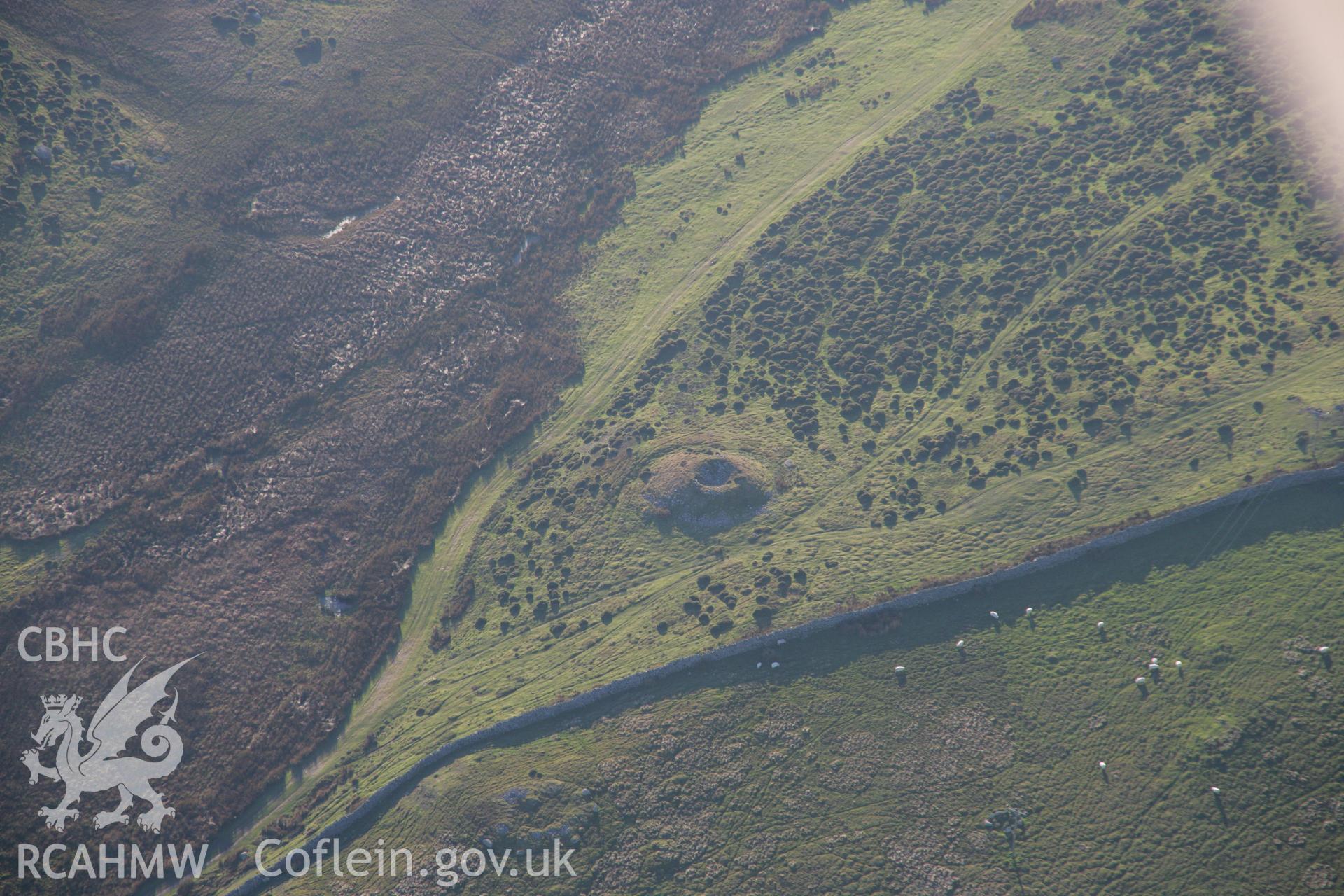 RCAHMW colour oblique aerial photograph of a cairn on Cefn Coch. Taken on 21 November 2005 by Toby Driver