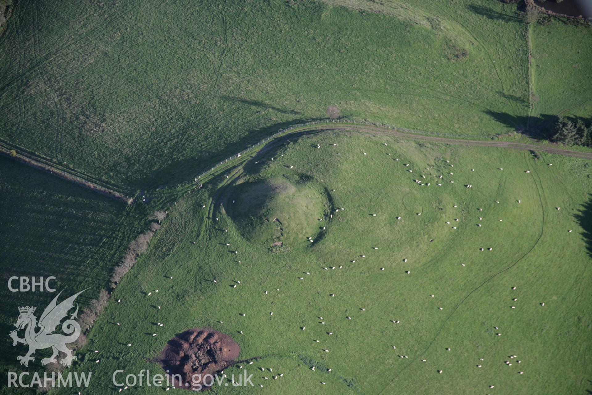 RCAHMW colour oblique aerial photograph of Tomen Bedd-Ugre from the west. Taken on 13 October 2005 by Toby Driver