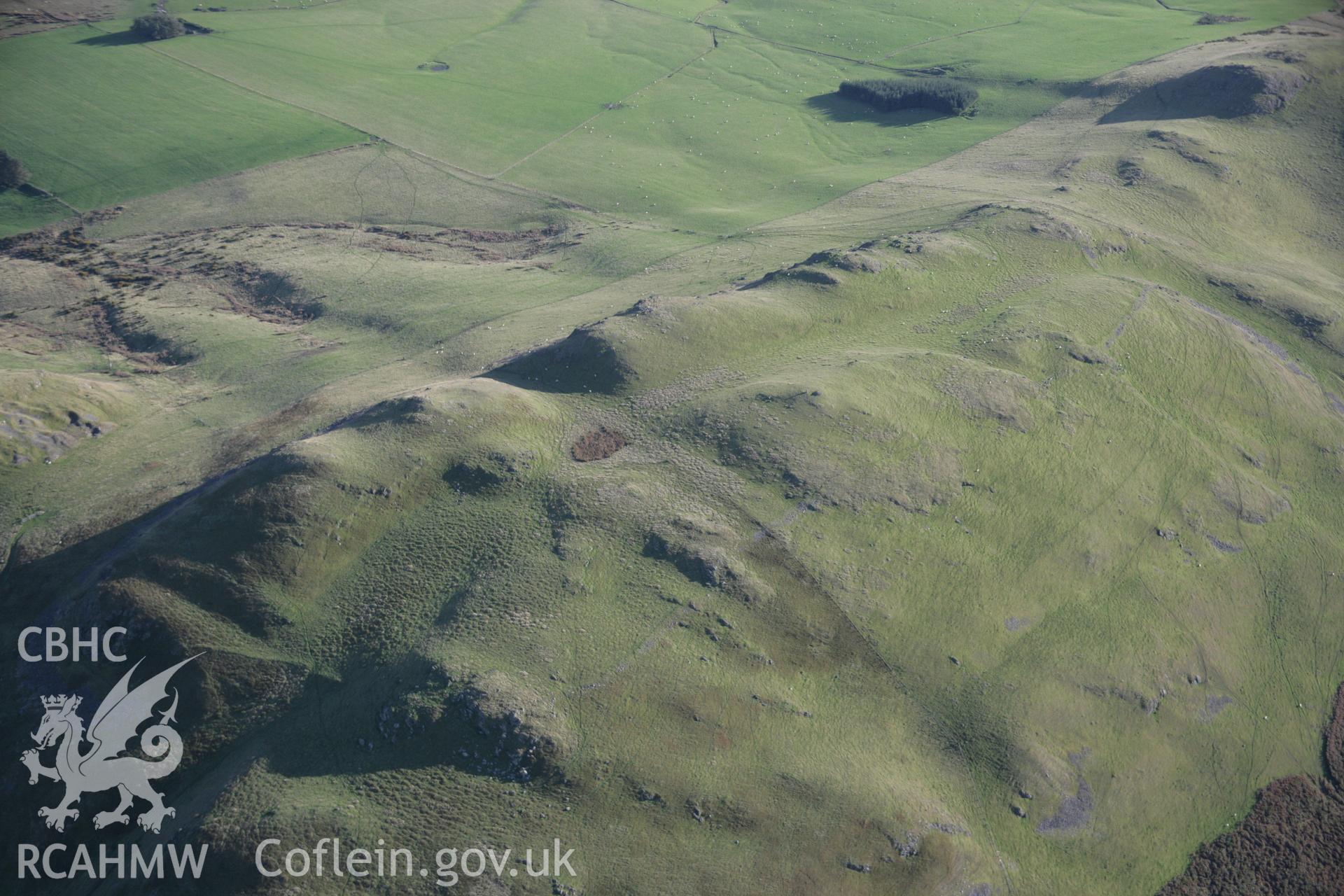 RCAHMW colour oblique aerial photograph of Llandegley Rocks West Enclosure showing hillfort and defended enclosure viewed from the north. Taken on 13 October 2005 by Toby Driver