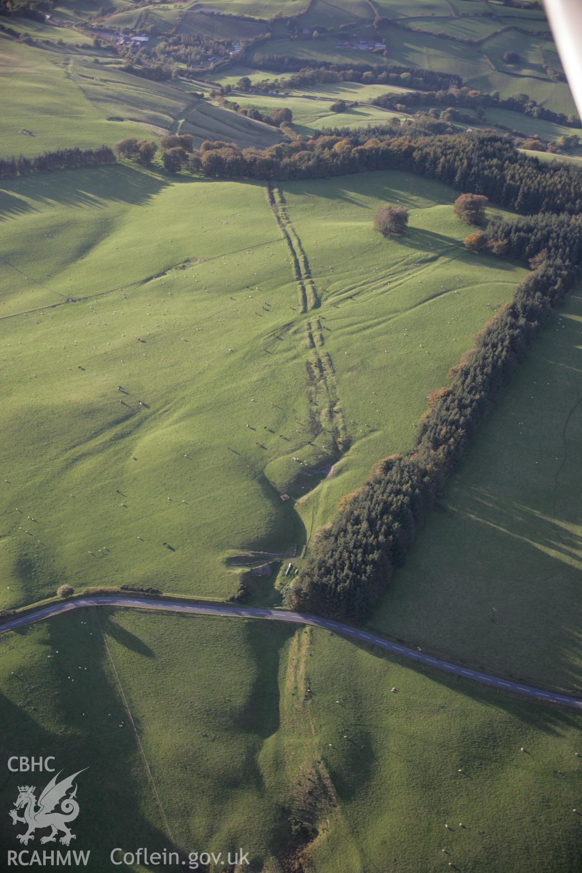 RCAHMW colour oblique aerial photograph of Crugyn Bank Dyke looking north-west. Taken on 13 October 2005 by Toby Driver