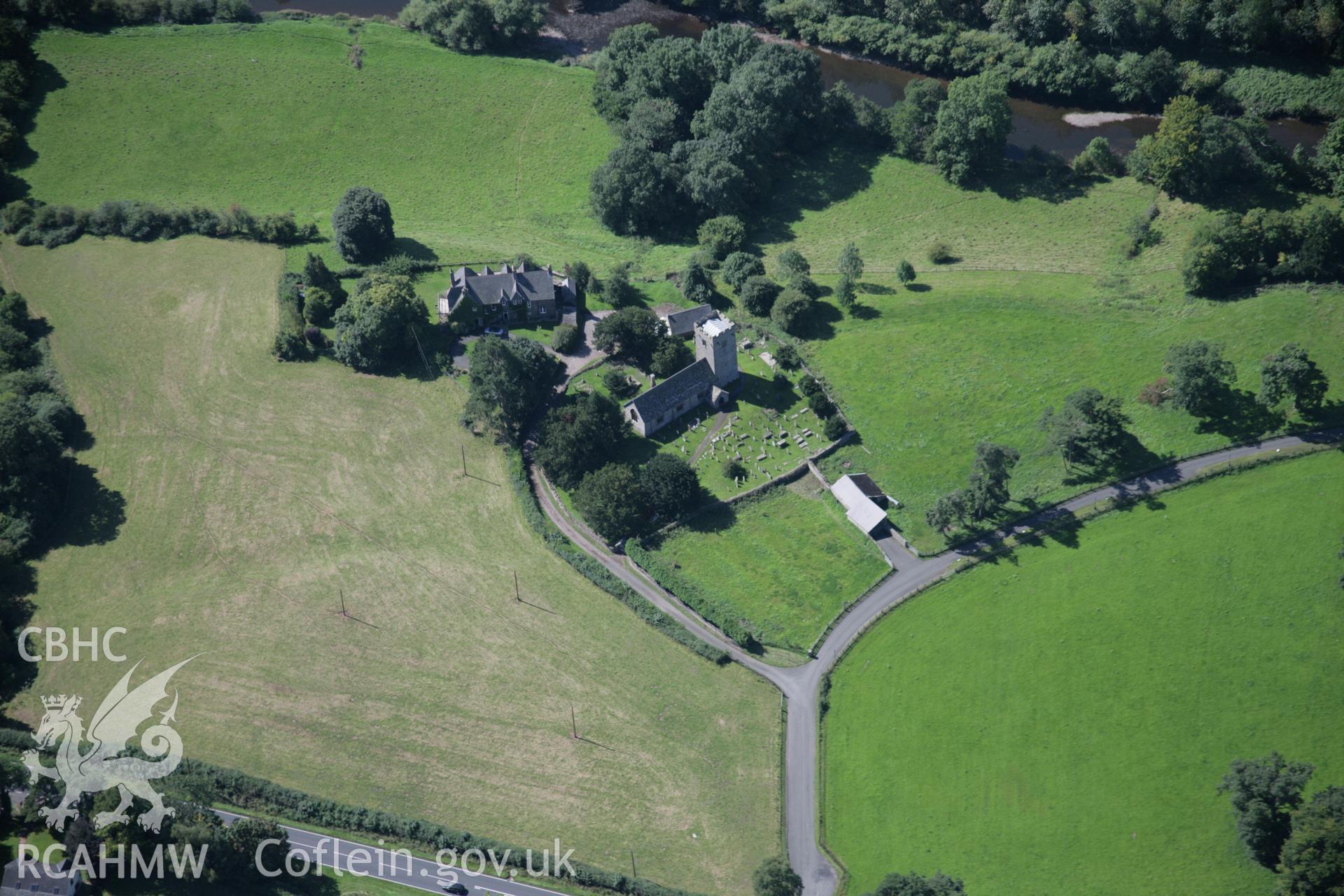RCAHMW digital colour oblique photograph of St. Illtyd's Church, Llanhamlach, viewed from the north. Taken on 02/09/2005 by T.G. Driver.