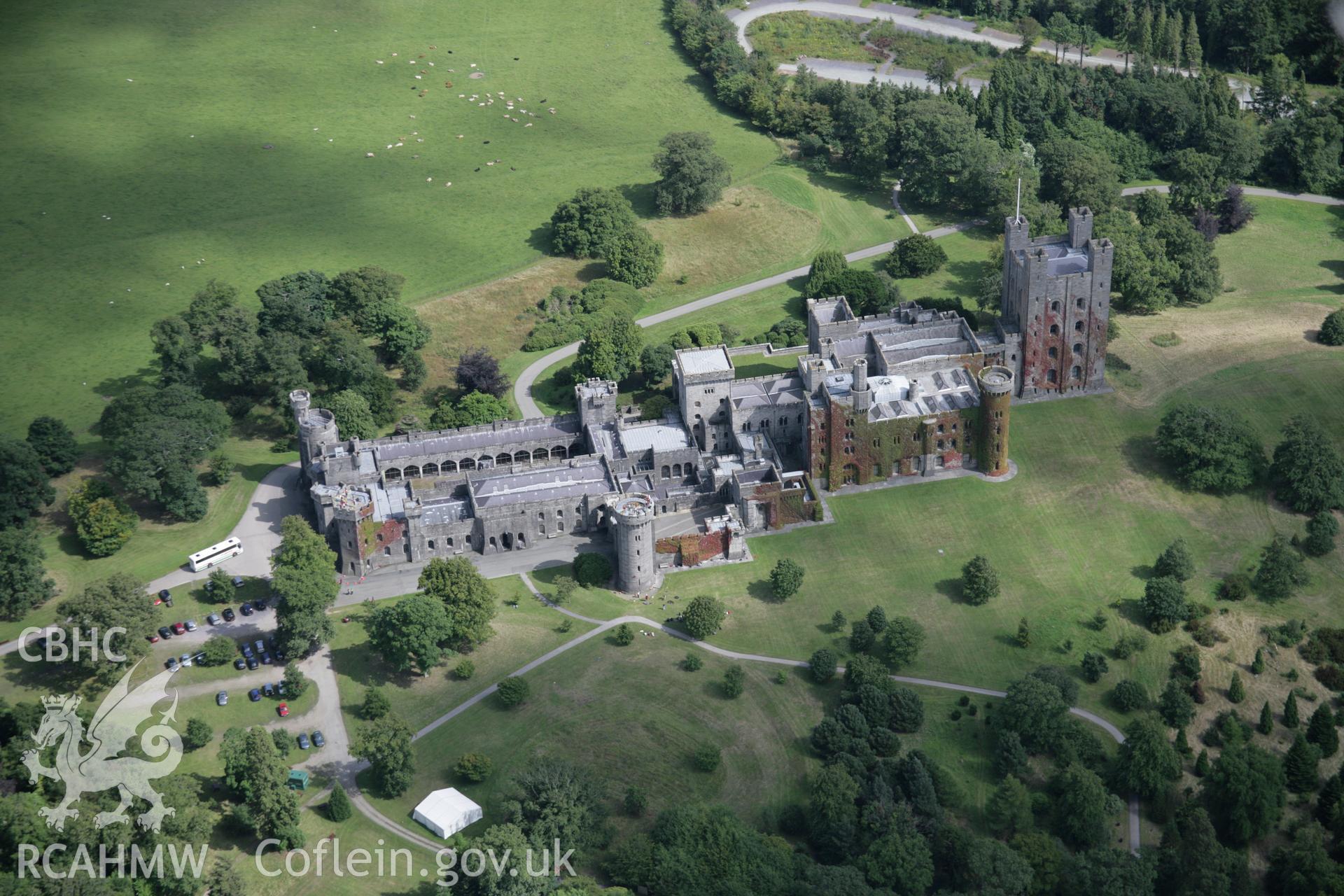 RCAHMW digital colour oblique photograph of Penrhyn Castle, Bangor, viewed from the west. Taken on 02/08/2005 by T.G. Driver.