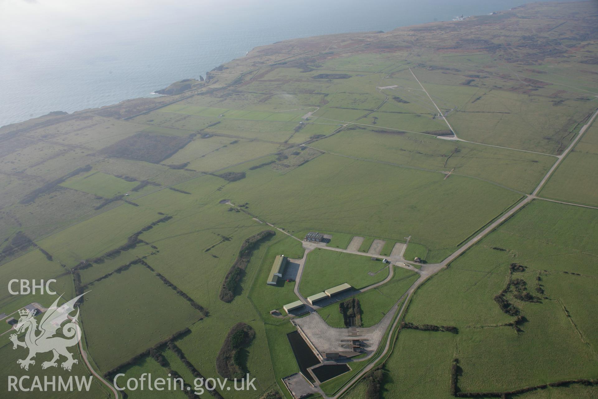 RCAHMW colour oblique aerial photograph of Castlemartin Training Area, showing a modern military installation near Trenorgan, looking south-west. Taken on 19 November 2005 by Toby Driver