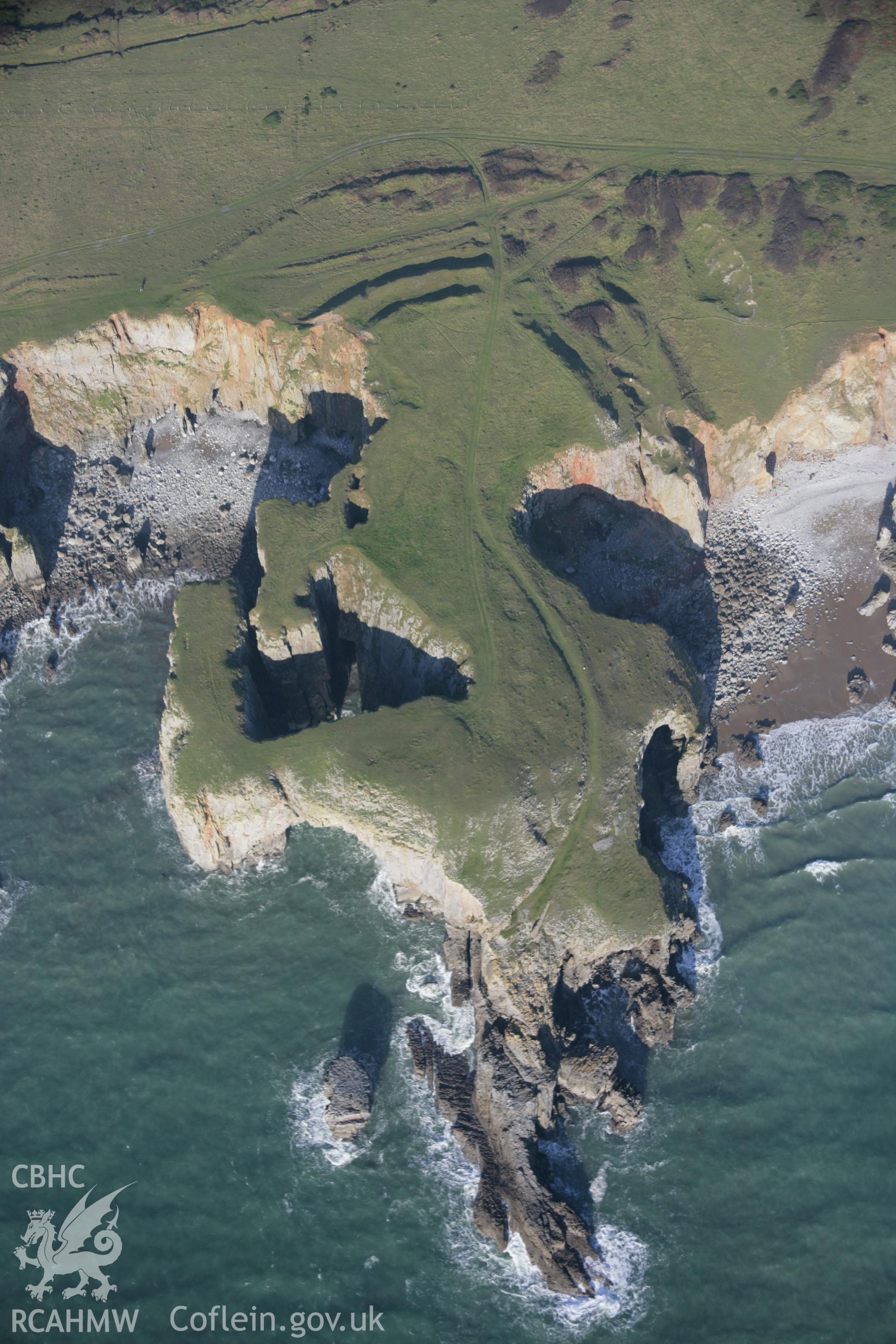RCAHMW colour oblique aerial photograph of Flimston Bay Camp, Castlemartin from the south. Taken on 19 November 2005 by Toby Driver