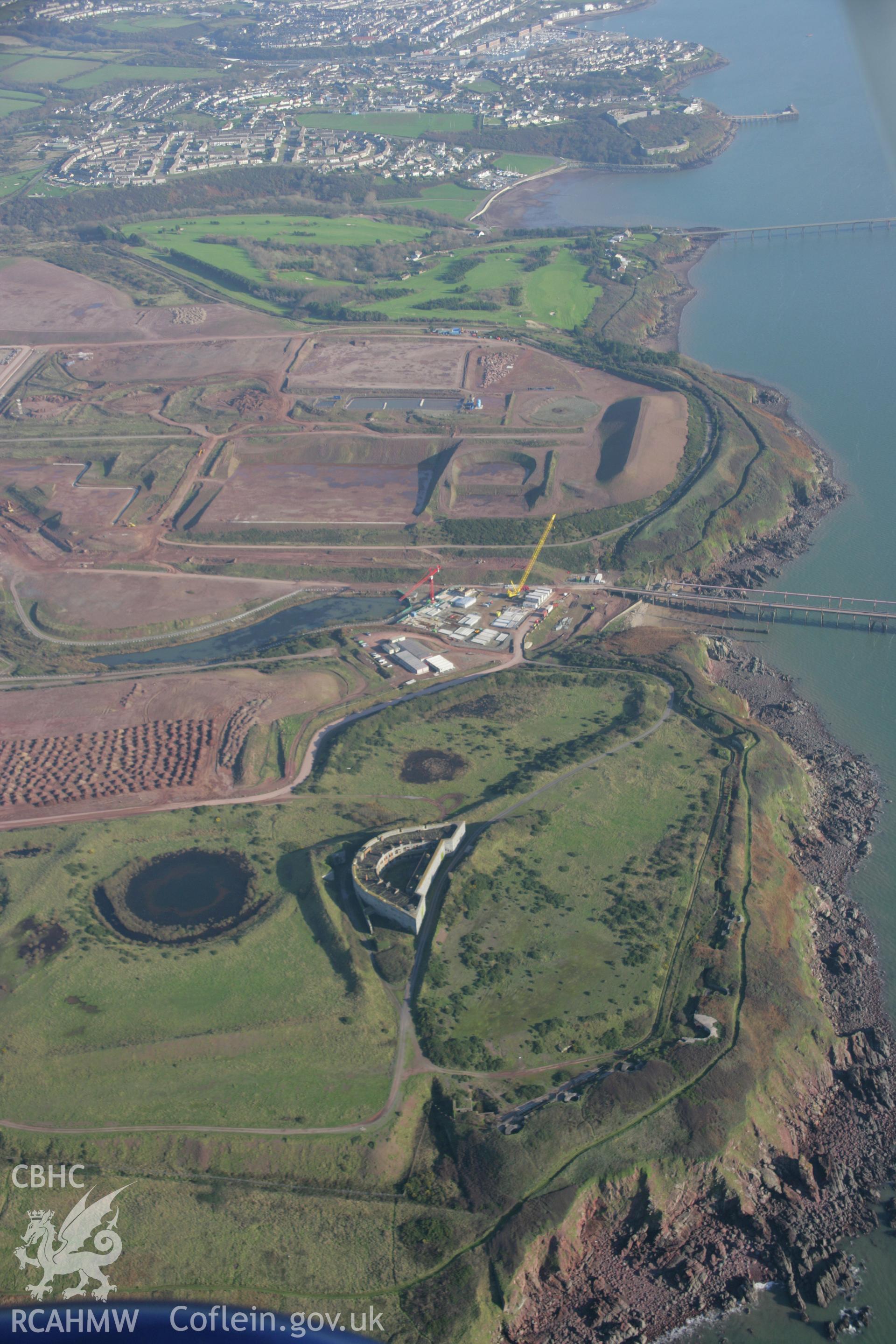 RCAHMW colour oblique aerial photograph of South Hook Fort from the west showing construction of the liquified natural gas depot beyond. Taken on 19 November 2005 by Toby Driver