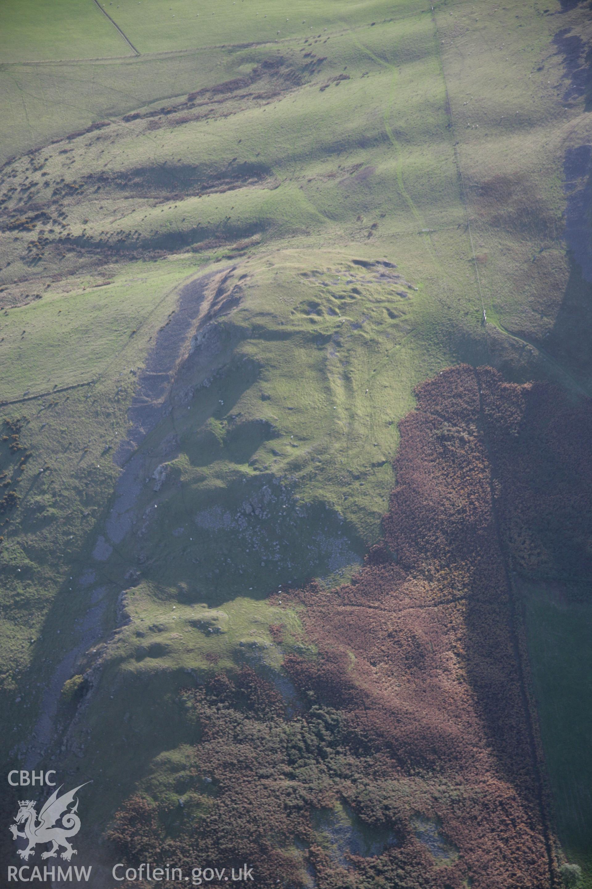 RCAHMW colour oblique aerial photograph of Llandegley Rocks Enclosure showing hillfort viewed from the north-east. Taken on 13 October 2005 by Toby Driver
