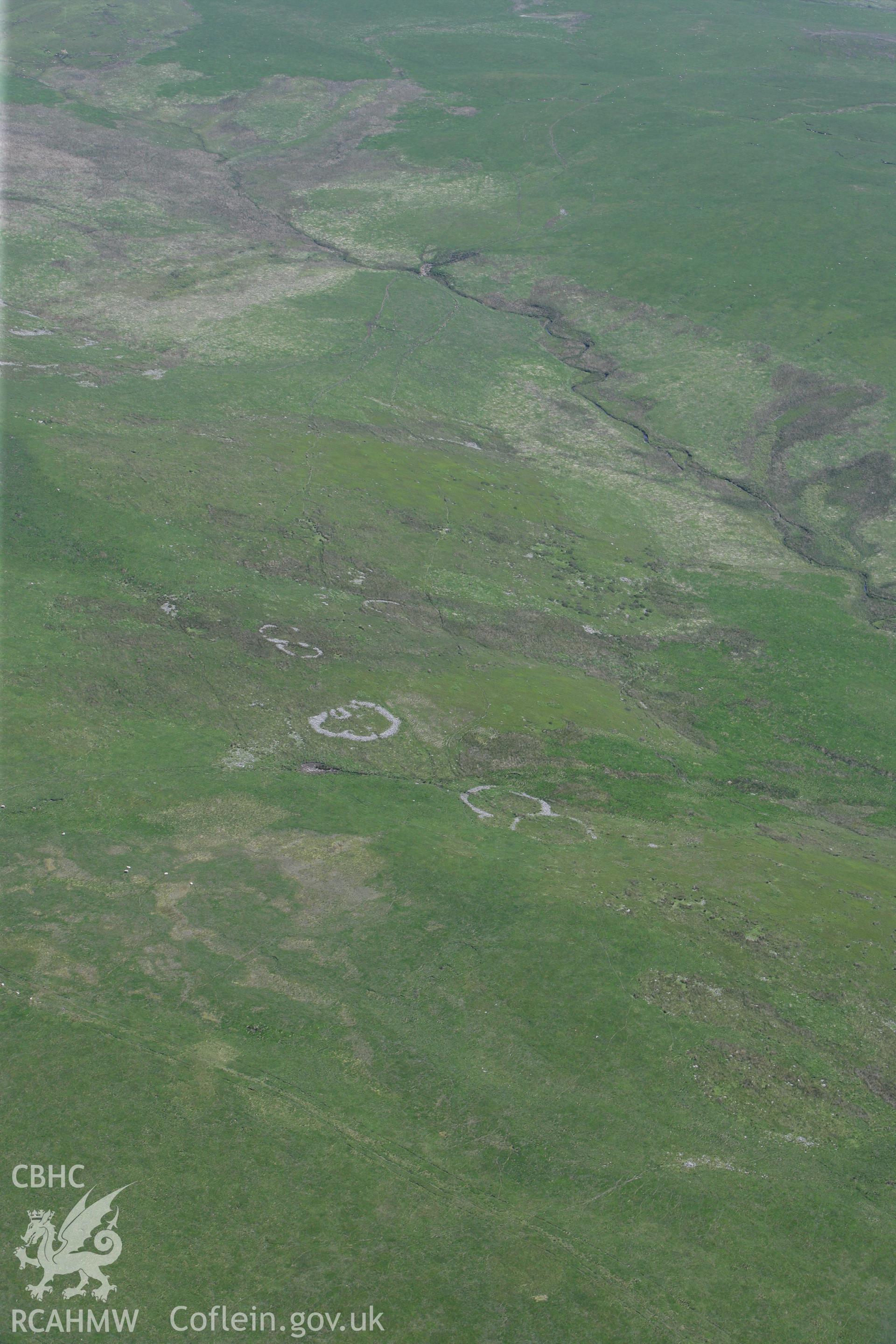 RCAHMW colour oblique photograph of Cefn Car Enclosures. Taken by Toby Driver on 09/06/2008.