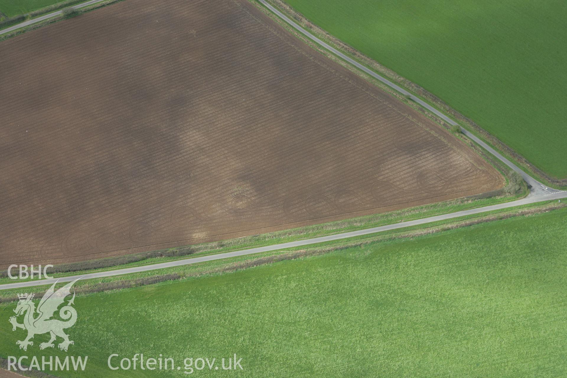 RCAHMW colour oblique photograph of Round Barrow, south-east of Parc y Llyn. Taken by Toby Driver on 24/04/2008.