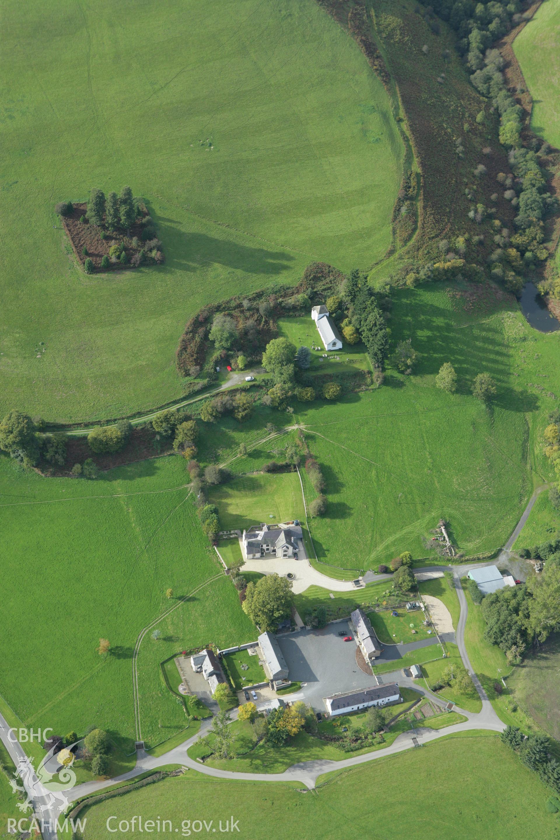 RCAHMW colour oblique photograph of St Mary's Church, Pilleth, with earthworks. Taken by Toby Driver on 10/10/2008.