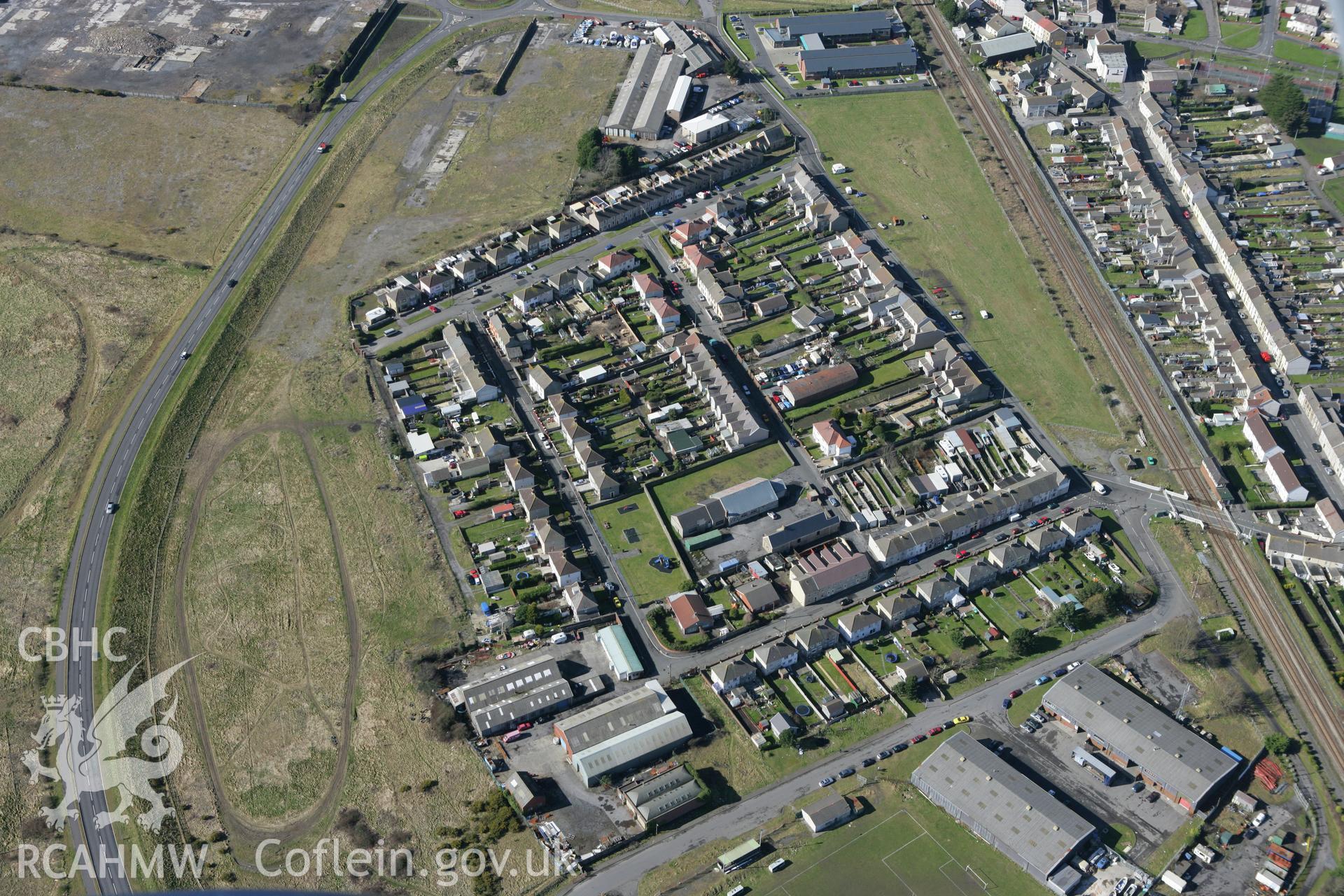 RCAHMW colour oblique photograph of housing to the south of Burry Port, looking west towards Burry Port English Methodist Chapel (Wesleyan). Taken by Toby Driver on 04/03/2008.