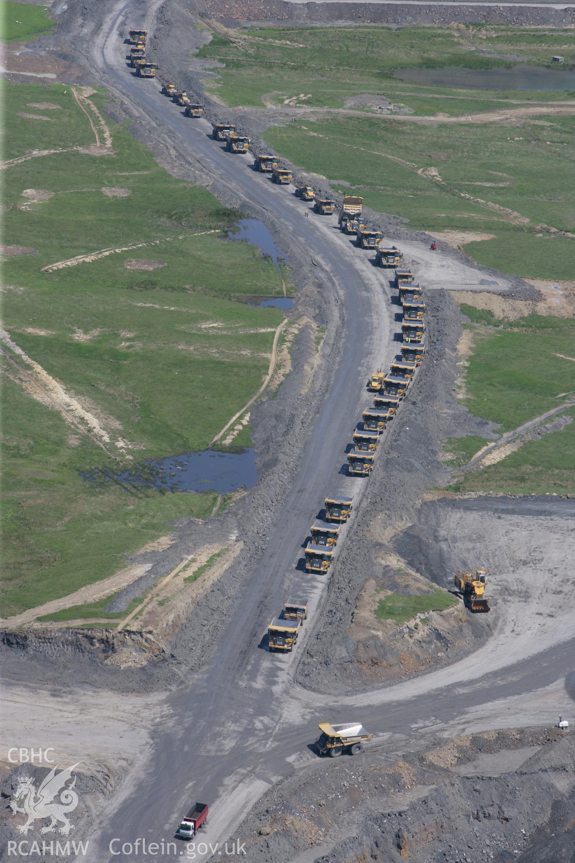 RCAHMW colour oblique photograph of lorries at Ffos-y-fran Dowlais Opencast workings. Taken by Toby Driver on 09/06/2008.