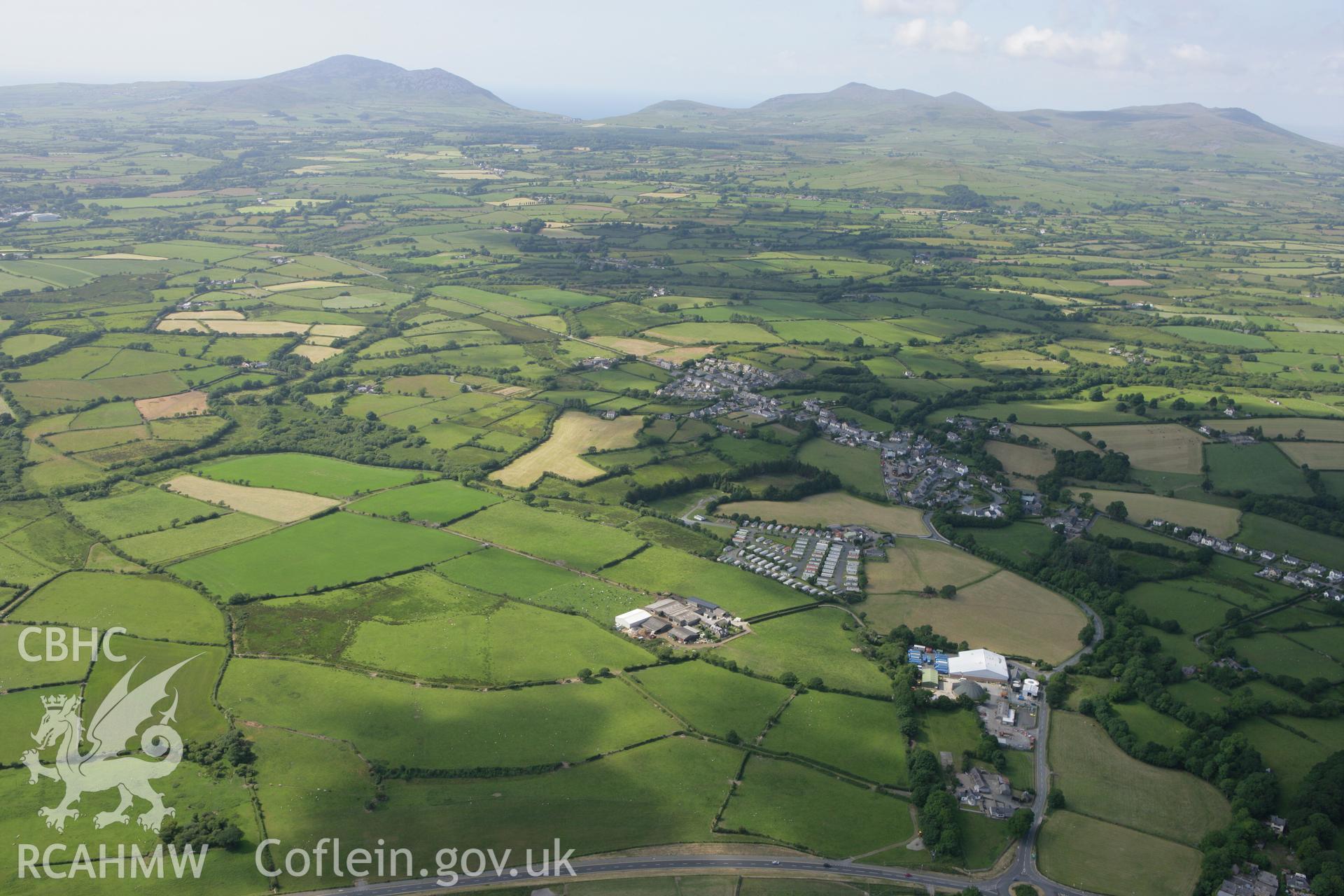 RCAHMW colour oblique photograph of Chwilog village, view from the south-east. Taken by Toby Driver on 13/06/2008.